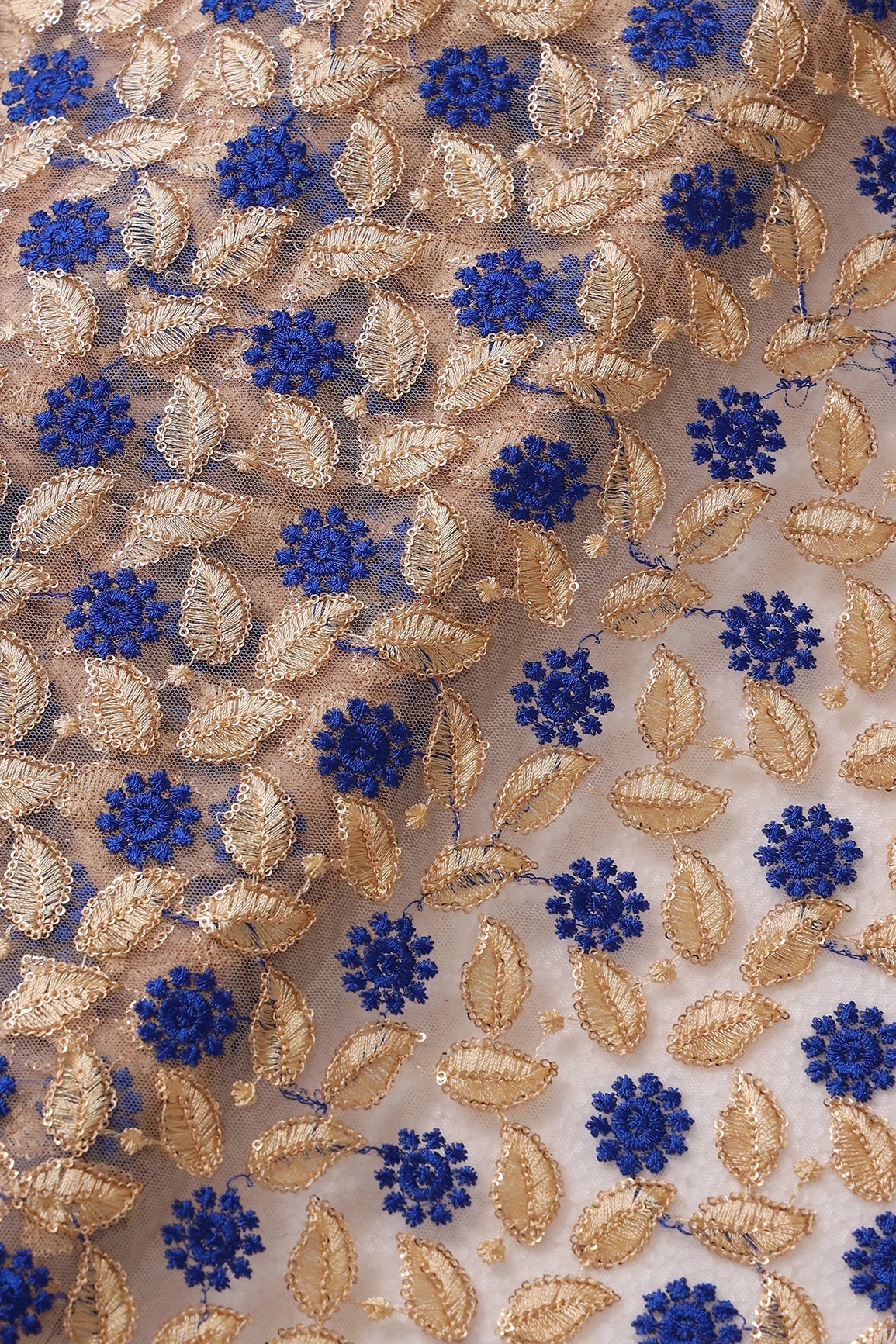 Blue And Beige Thread With Sequins Leafy Embroidery On Beige Soft Net Fabric - doeraa