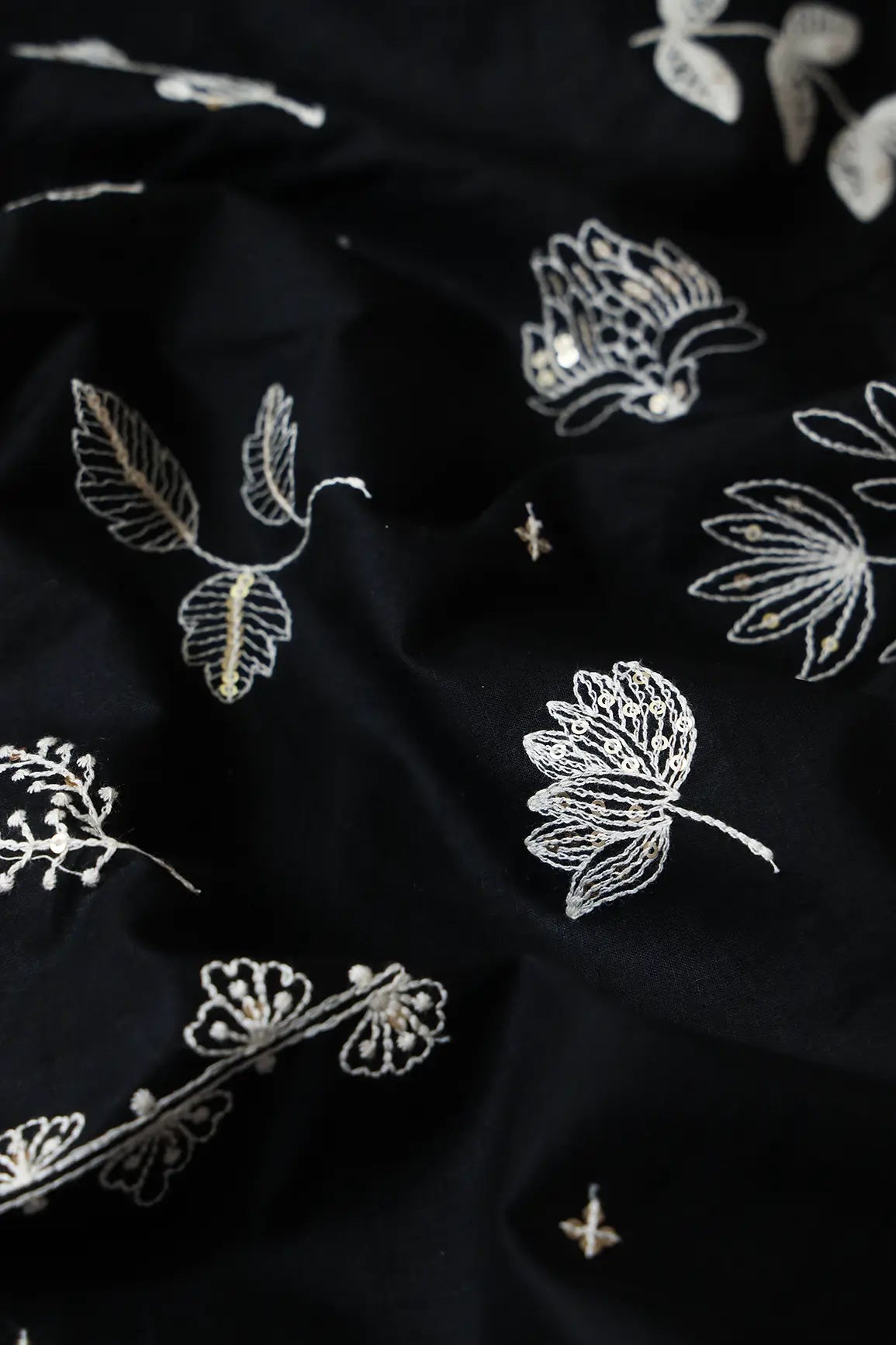 Cream Thread With Gold Sequins Floral Embroidery Work On Black Cotton Cambric Fabric - doeraa