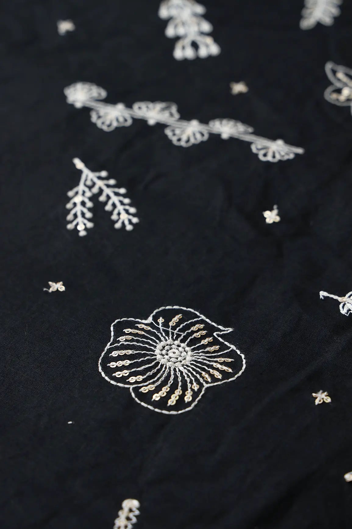 Cream Thread With Gold Sequins Floral Embroidery Work On Black Cotton Cambric Fabric - doeraa