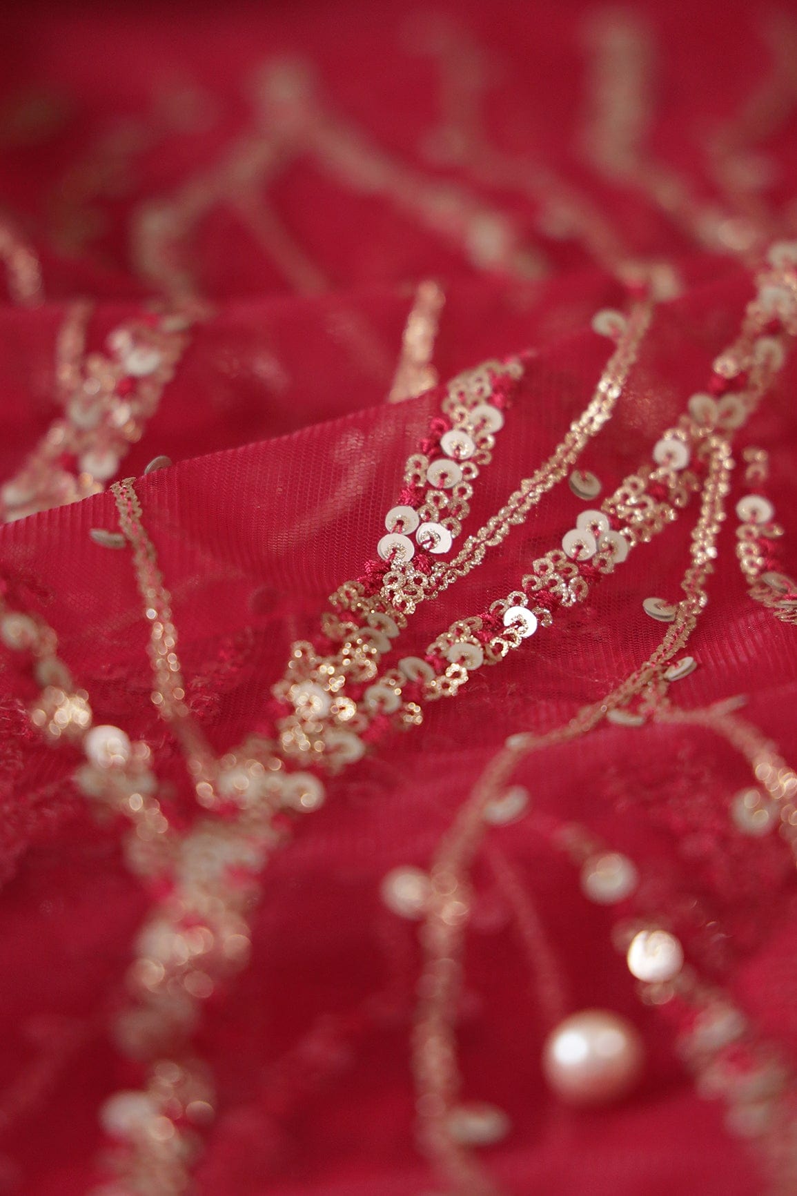 Gold And Silver Sequins With Red Thread Wavy Embroidery Work On Cherry Red Soft Net Fabric - doeraa