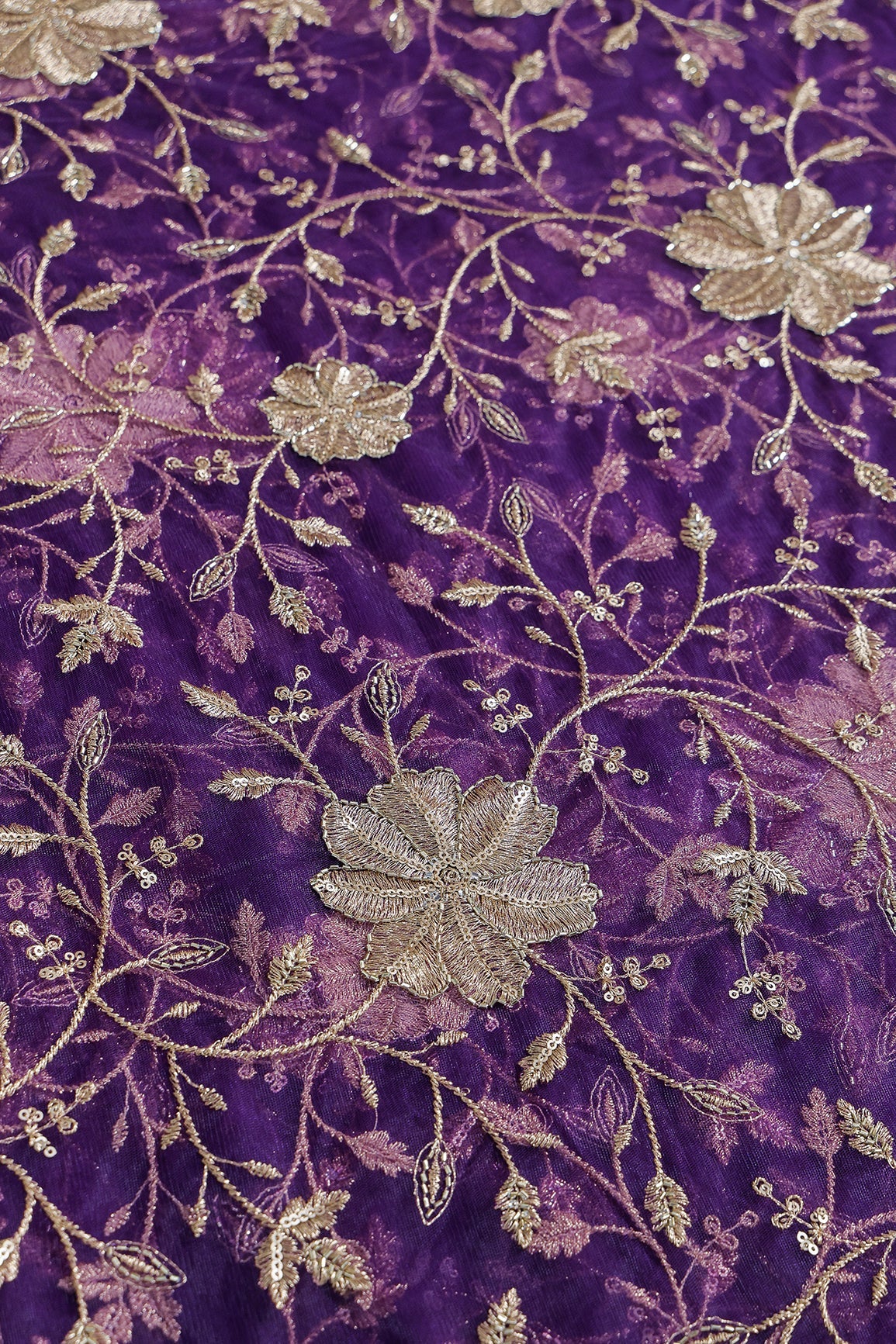 Gold Sequins & Beads With Zari Floral Leafy Embroidery Work On Purple Soft Net Fabric - doeraa