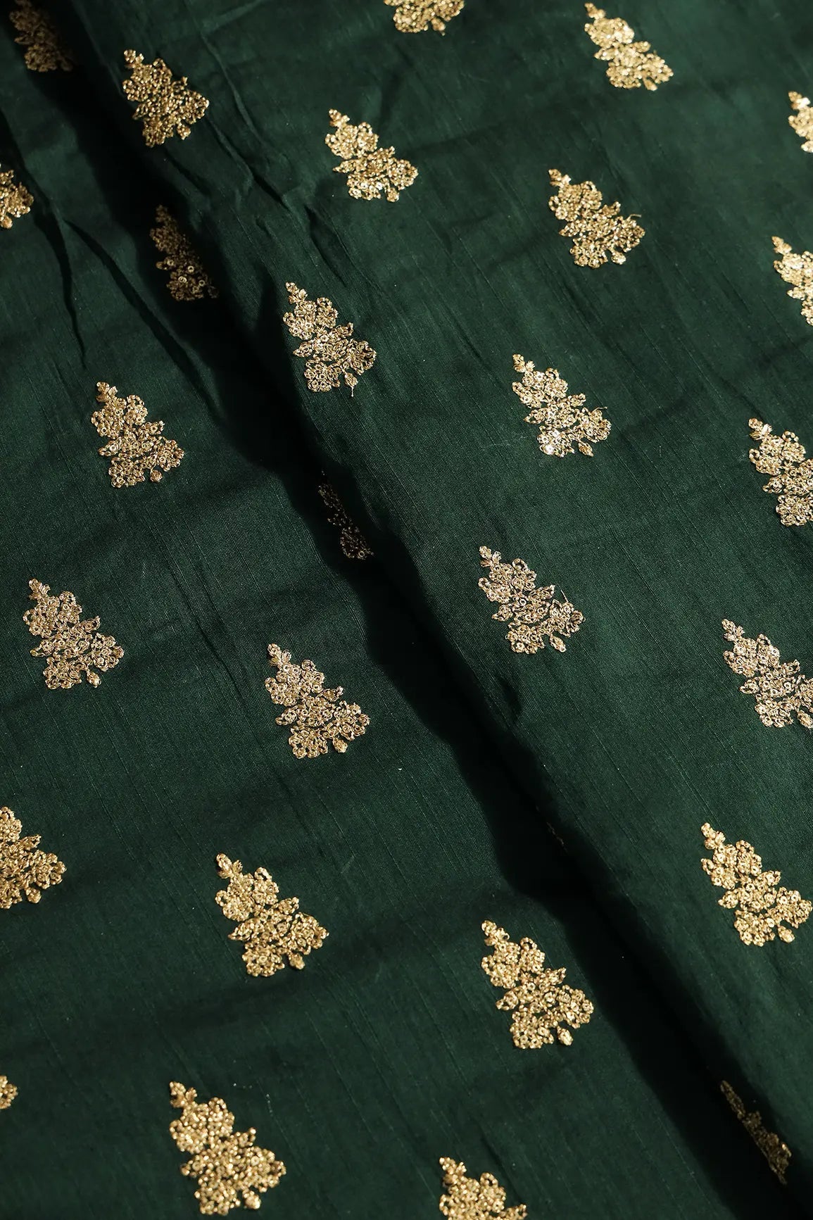 Gold Sequins With Gold Zari Big Motif Embroidery Work On Bottle Green Raw Silk Fabric - doeraa