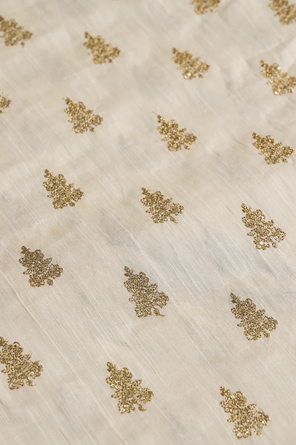 Gold Sequins With Gold Zari Big Motif Embroidery Work On Cream Raw Silk Fabric - doeraa