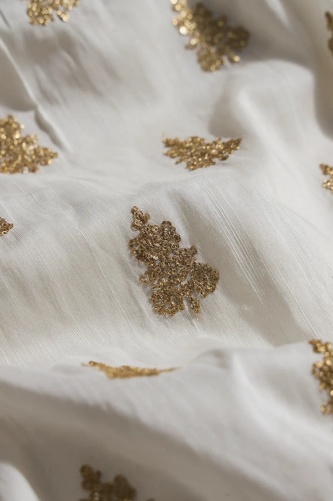 Gold Sequins With Gold Zari Big Motif Embroidery Work On White Raw Silk Fabric - doeraa
