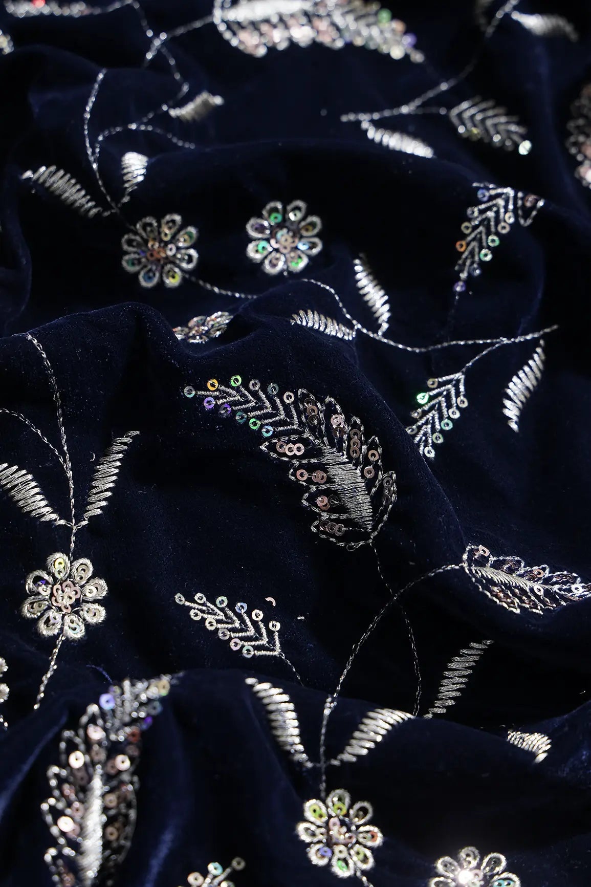 Gold Sequins With Gold Zari Floral Leafy Embroidery Work On Navy Blue Velvet Fabric - doeraa