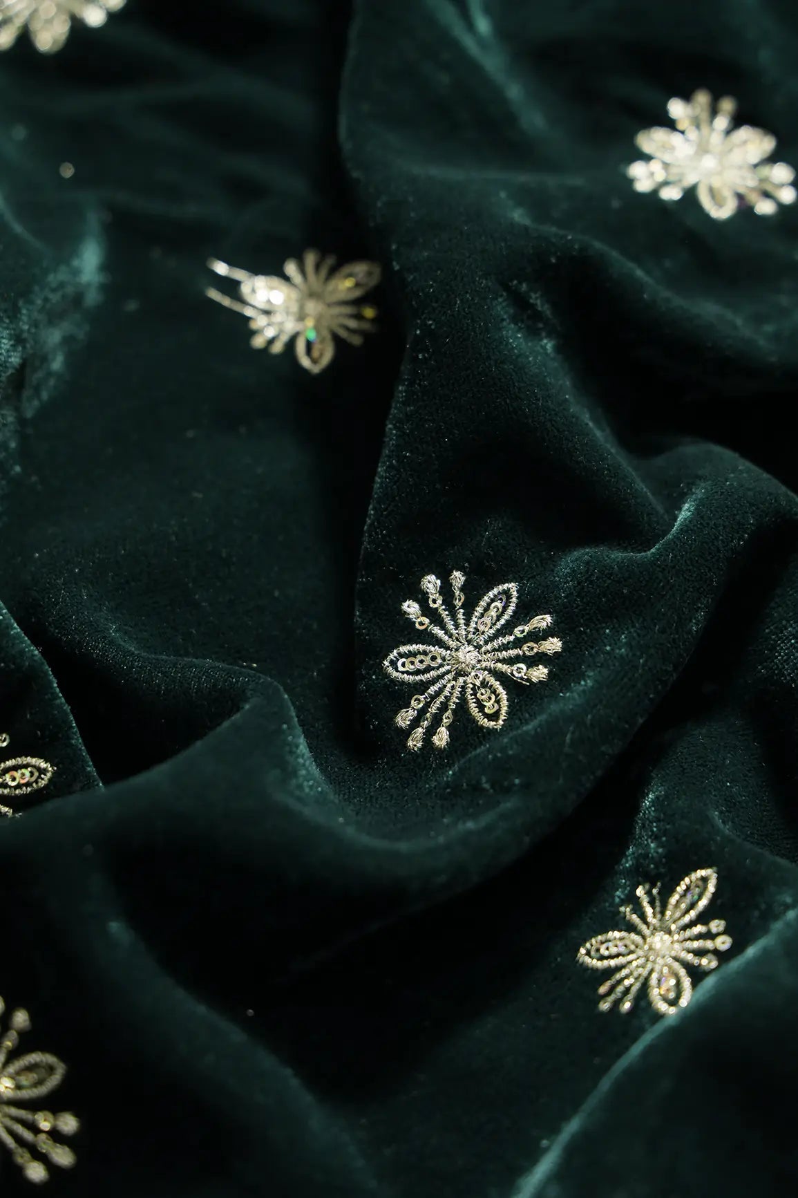 Gold Sequins With Gold Zari Small Floral Motif Embroidery Work On Bottle Green Velvet Fabric - doeraa