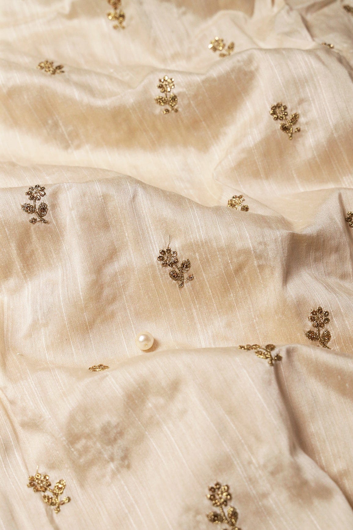 Gold Sequins With Gold Zari Small Floral Motif Embroidery Work On White Raw Silk Fabric - doeraa