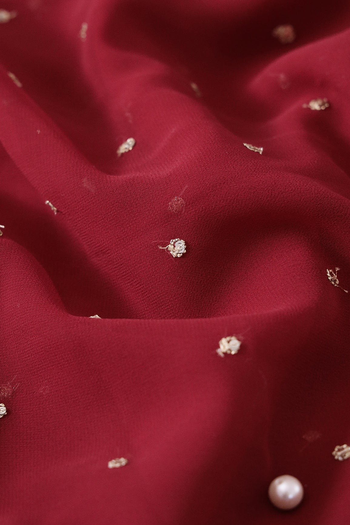 Gold Sequins With Gold Zari Small Motif Embroidery Work On Dark Maroon Georgette Fabric - doeraa