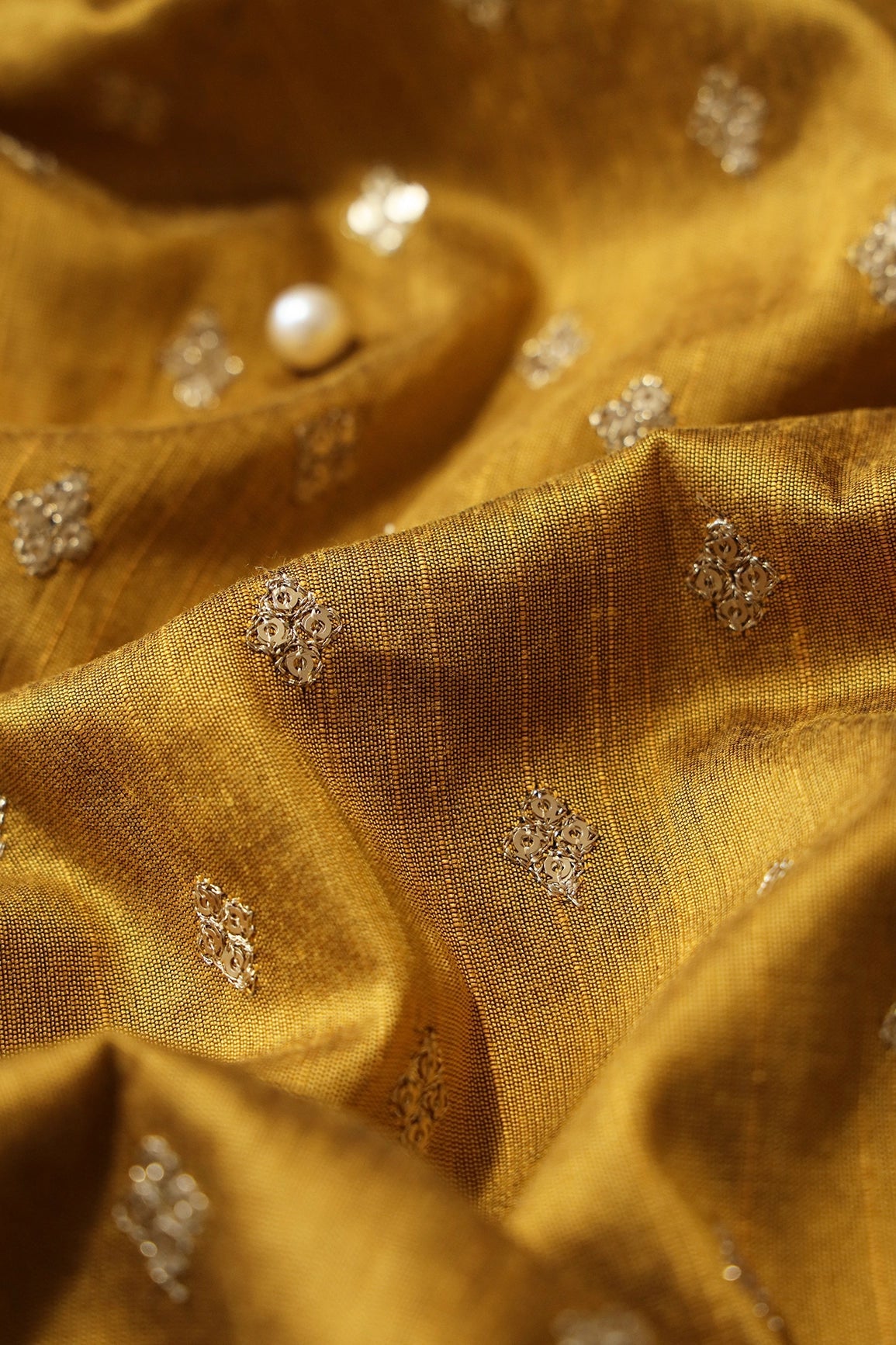 Gold Sequins With Gold Zari Small Motif Embroidery Work On Mustard Raw Silk Fabric - doeraa