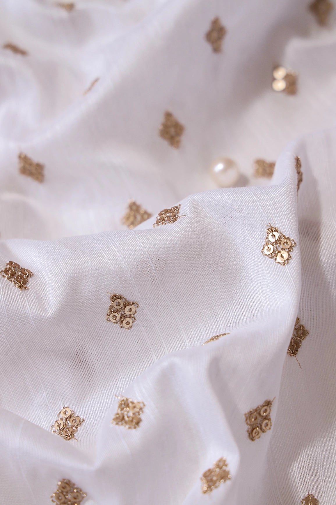 Gold Sequins With Gold Zari Small Motif Embroidery Work On White Raw Silk Fabric - doeraa