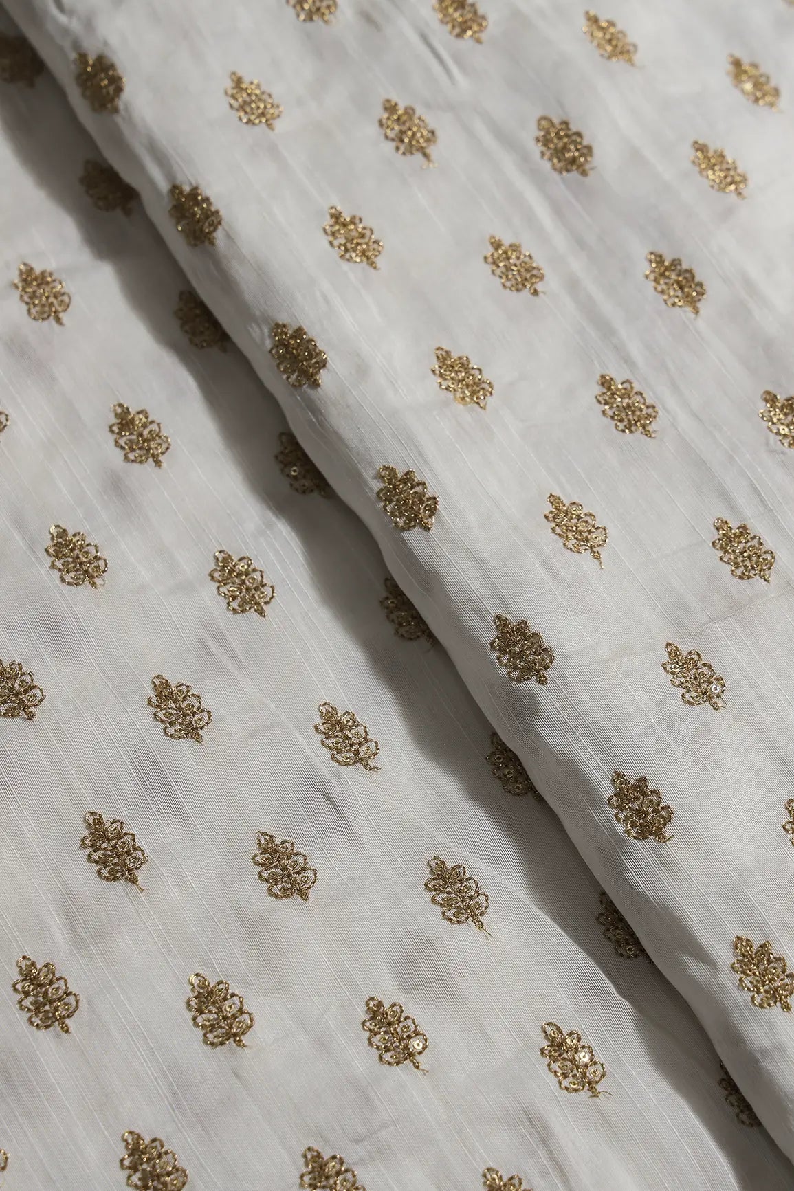 Gold Sequins With Gold Zari Small Motif Embroidery Work On White Raw Silk Fabric - doeraa