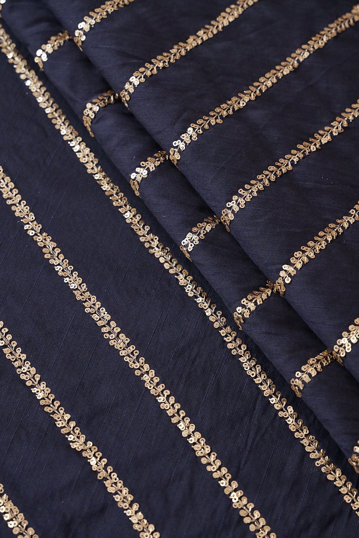 Gold Sequins With Gold Zari Stripes Embroidery Work On Navy Blue Raw Silk Fabric - doeraa