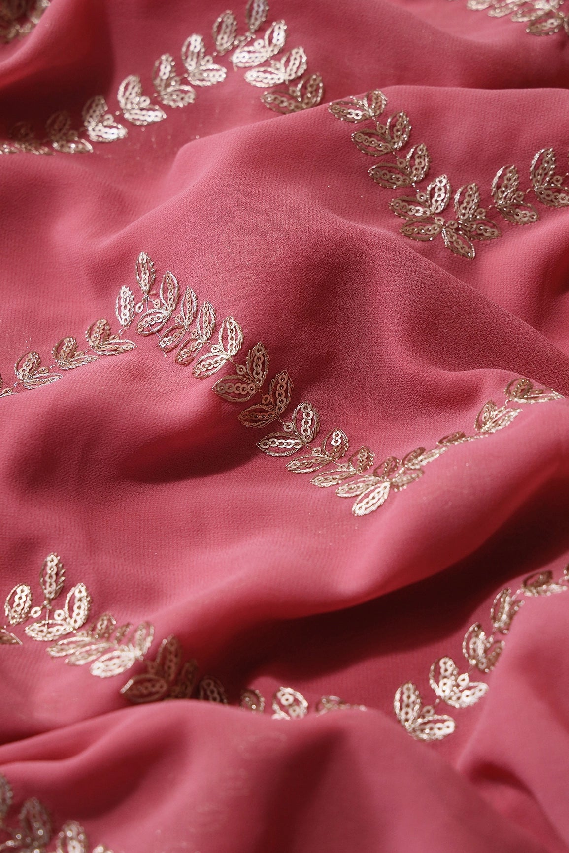 Gold Zari With Gold Sequins Chevron Embroidery Work On Gajri Pink Georgette Fabric - doeraa