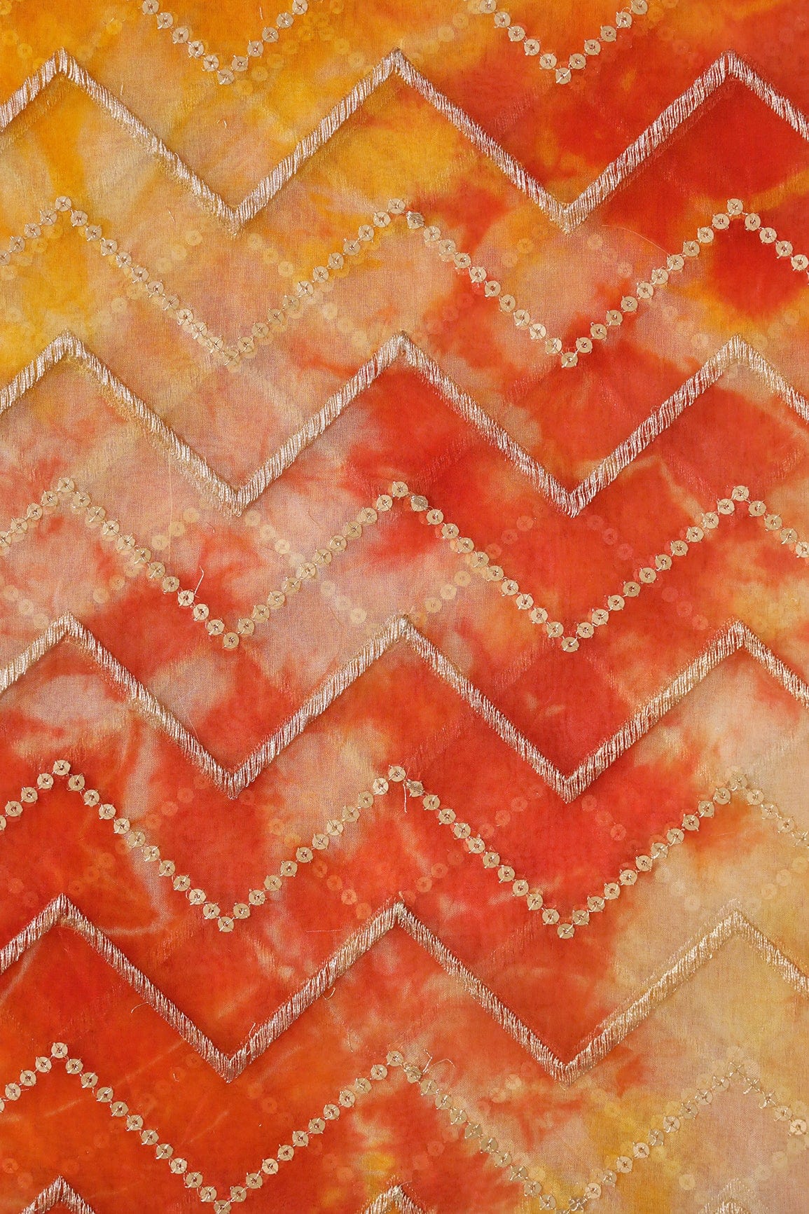Gold Zari With Gold Sequins Chevron Embroidery Work On Tie & Dye Dark Orange And Yellow Organza Fabric - doeraa