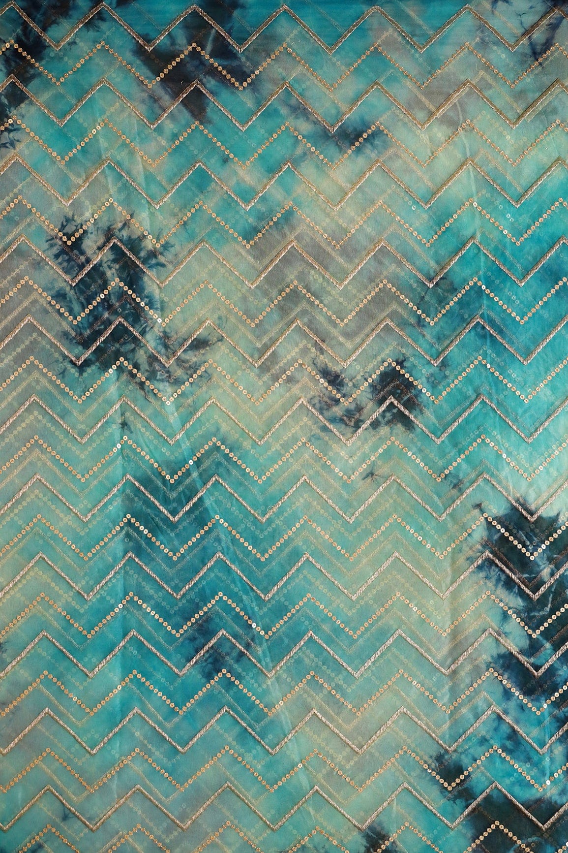Gold Zari With Gold Sequins Chevron Embroidery Work On Tie & Dye Turquoise And Light Blue Organza Fabric - doeraa