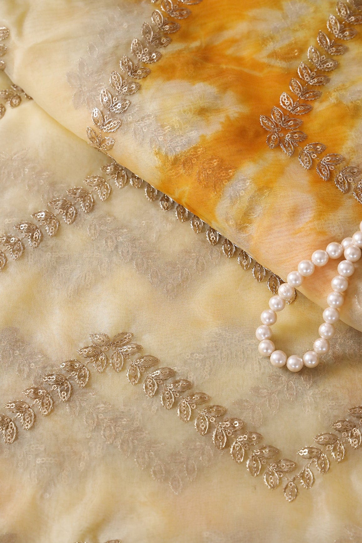 Gold Zari With Gold Sequins Chevron Embroidery Work On Tie & Dye Yellow Organza Fabric - doeraa