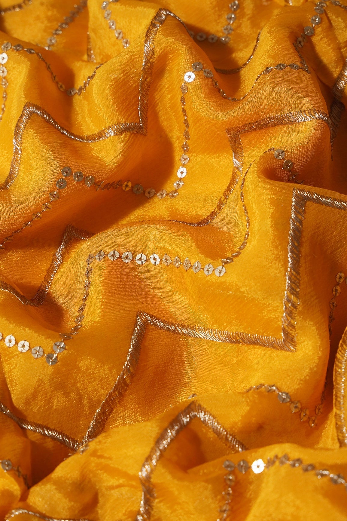 Gold Zari With Gold Sequins Chevron Embroidery Work On Yellow Chinnon Chiffon Fabric - doeraa