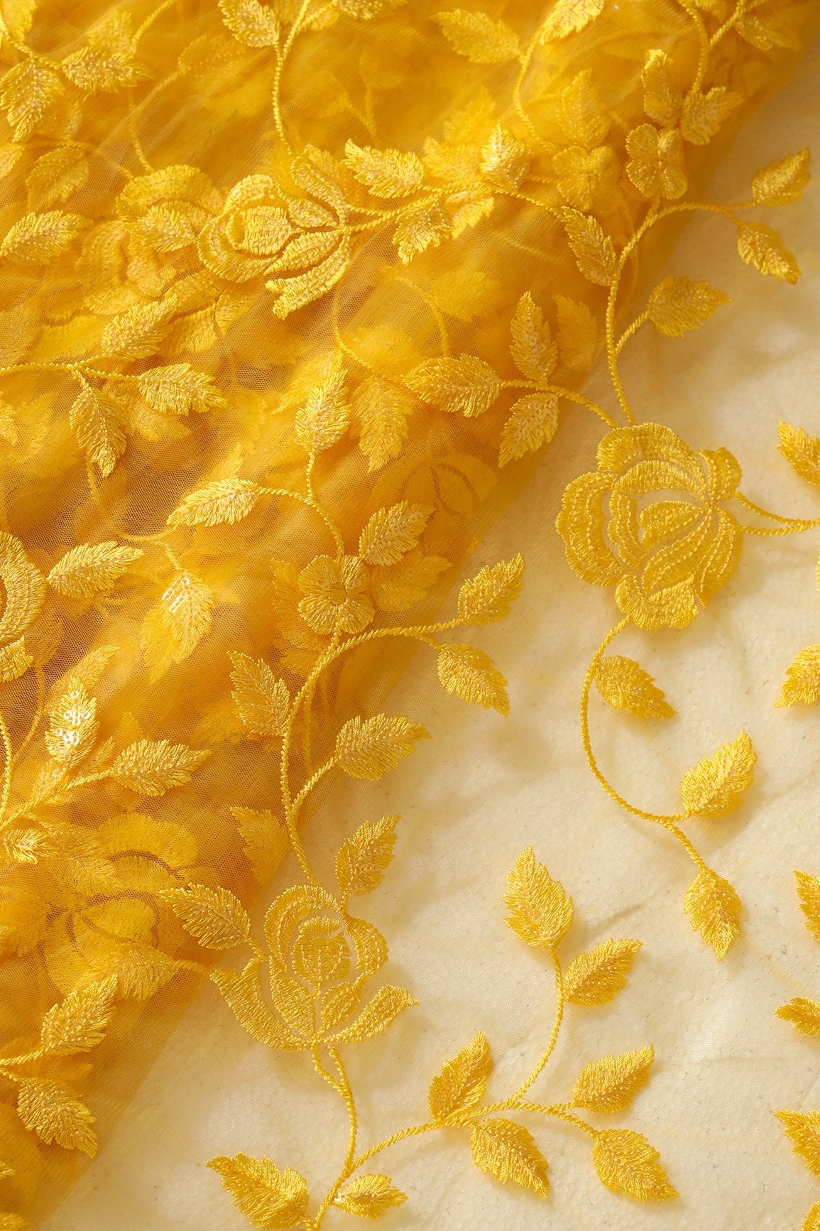 Gorgeous Yellow Thread With Sequins Floral Leafy Embroidery On Mustard Yellow Soft Net Fabric - doeraa