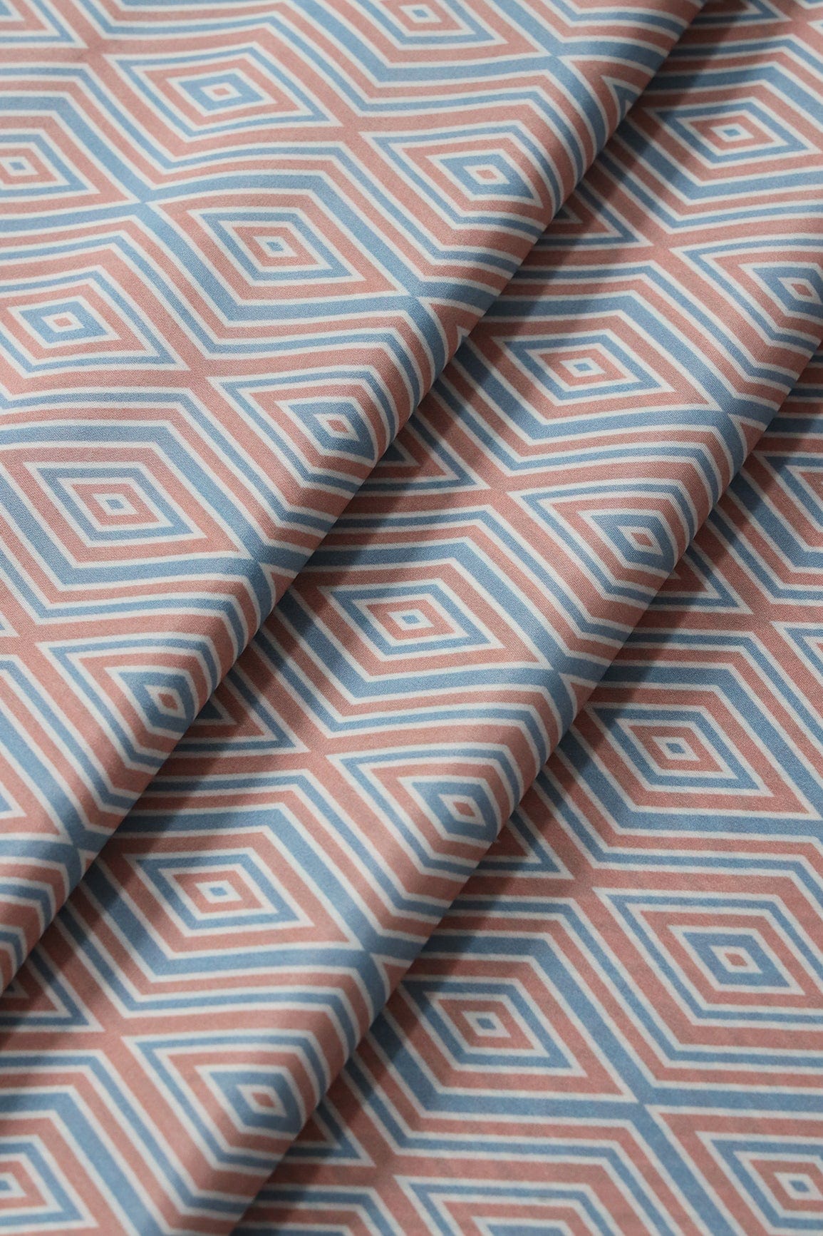 Light Peach And Pastel Blue Geometric Pattern Digital Print On French Crepe Fabric - doeraa