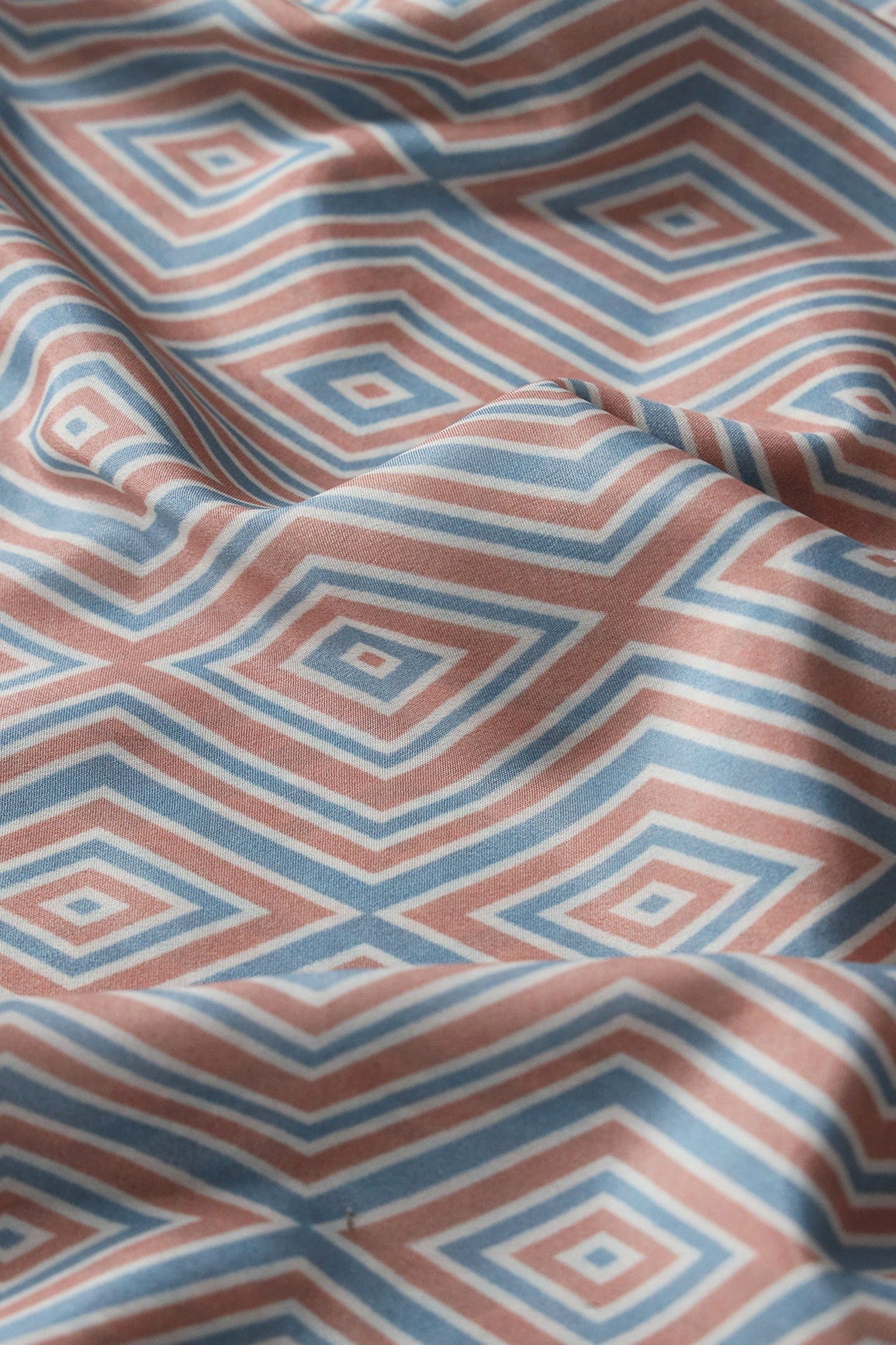 Light Peach And Pastel Blue Geometric Pattern Digital Print On French Crepe Fabric - doeraa