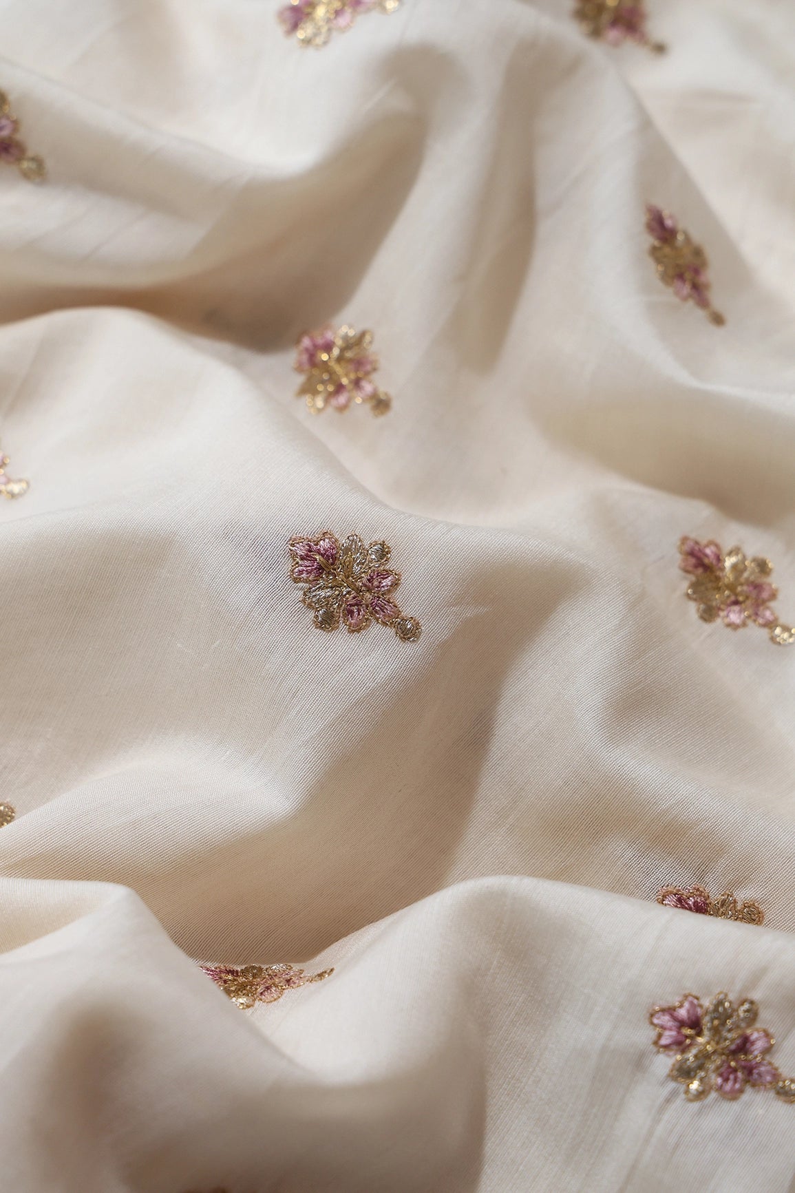 Mauve Thread With Gold Zari Small Floral Booti On Cream Chanderi Fabric - doeraa