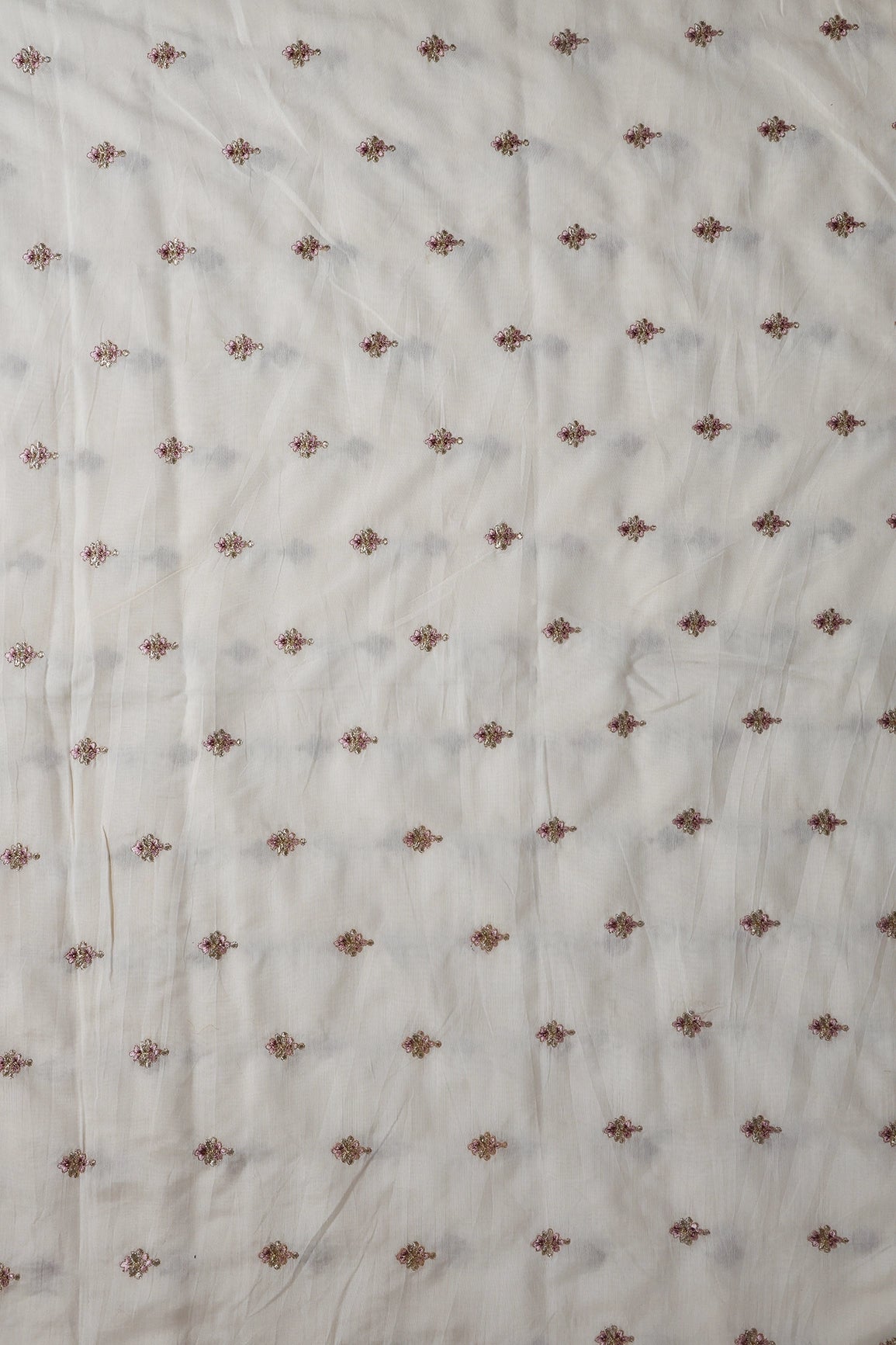 Mauve Thread With Gold Zari Small Floral Booti On Cream Chanderi Fabric - doeraa
