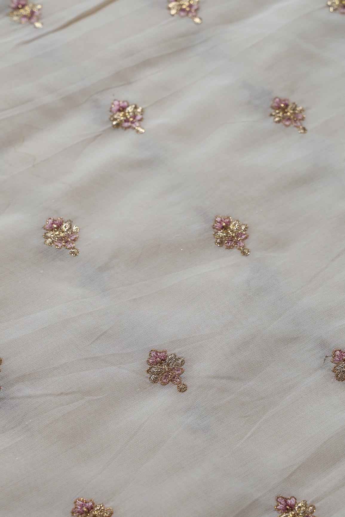 Mauve Thread With Gold Zari Small Floral Booti On Cream Chanderi Fabric - doeraa