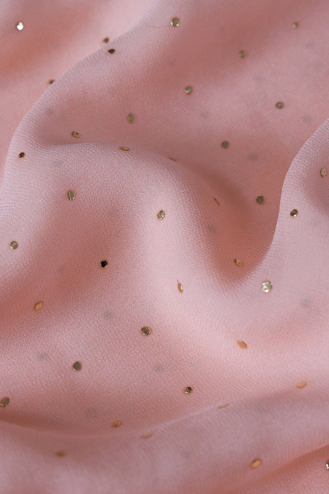 Mukaish Work On Light Peach Viscose Georgette Fabric - doeraa