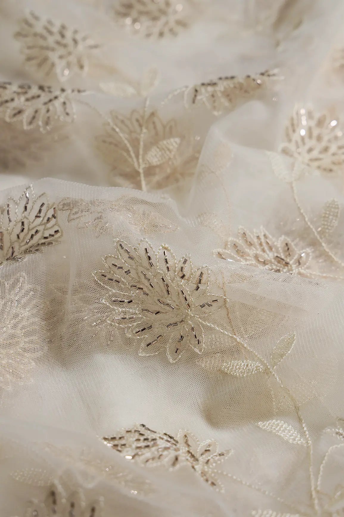 Off White Thread & Gold Beads With Water Sequins Floral Embroidery On Off White Soft Net Fabric - doeraa
