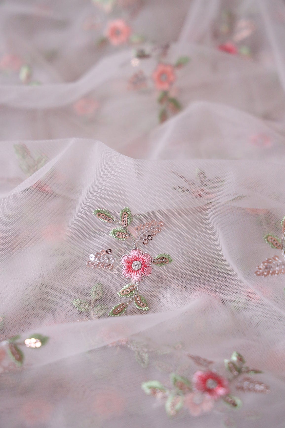 Olive And Pink Thread With Gold Sequins Floral Butta Embroidery On Pastel Grey Soft Net Fabric - doeraa