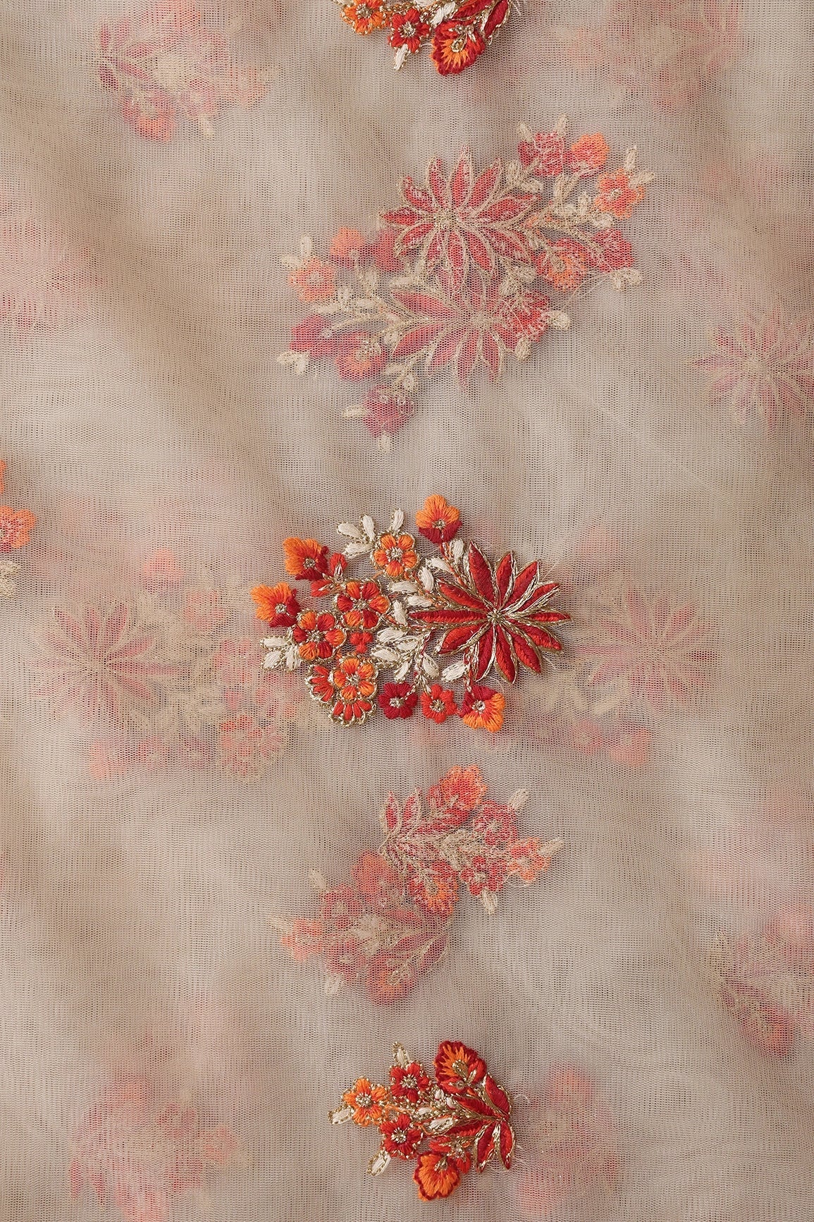 Orange And Beige Thread With Gold Zari Floral Butta Embroidery On Beige Soft Net Fabric - doeraa