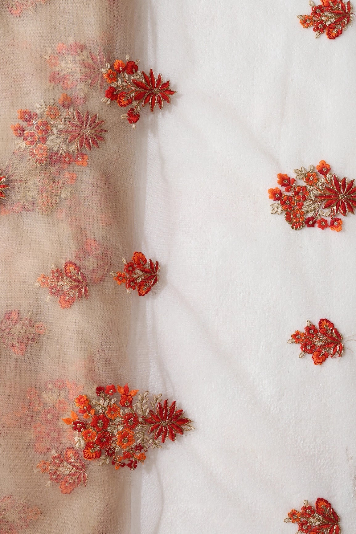 Orange And Beige Thread With Gold Zari Floral Butta Embroidery On Beige Soft Net Fabric - doeraa