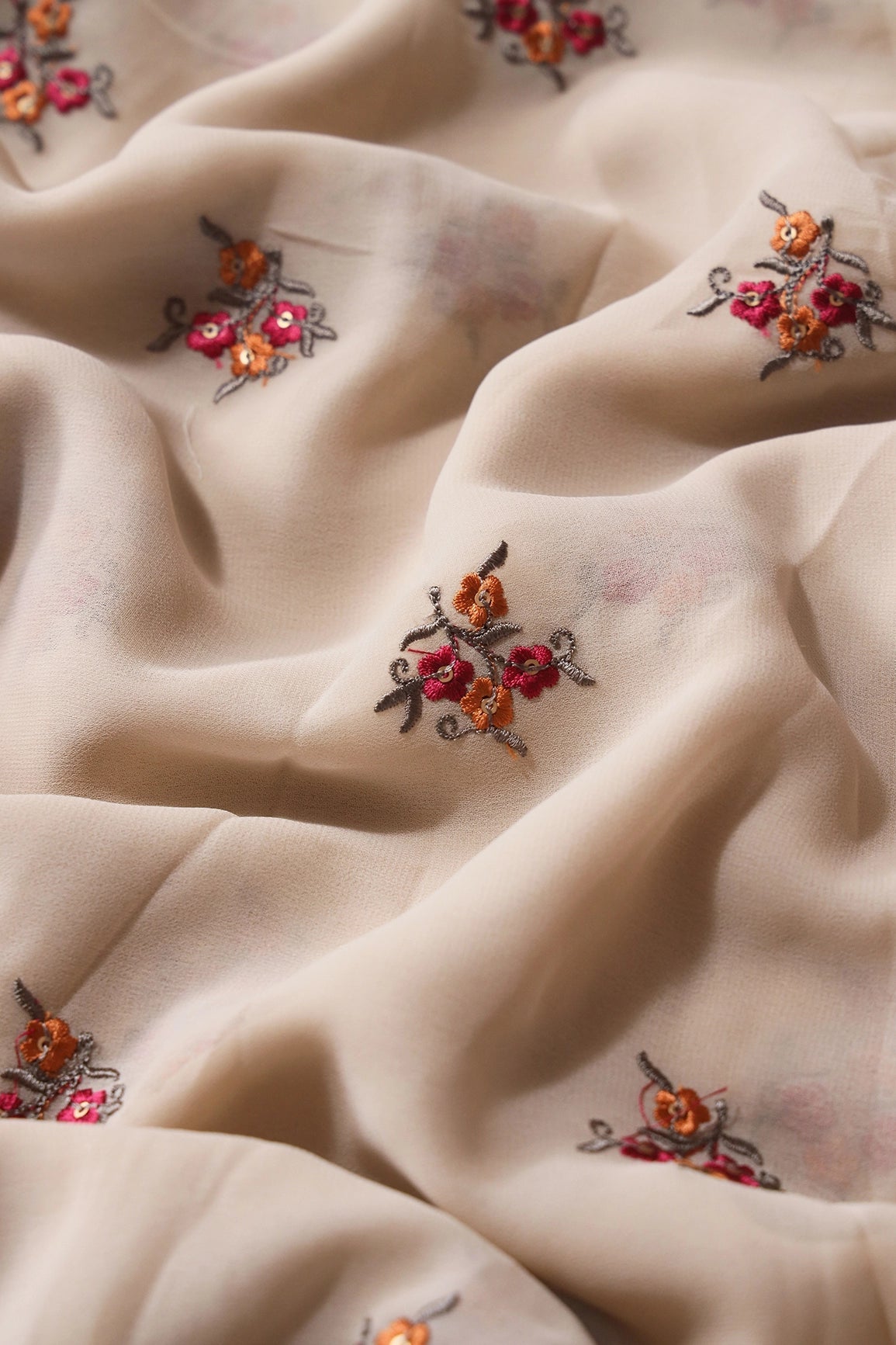 Orange And Dark Pink Thread With Sequins Floral Embroidery Work On Beige Georgette Fabric - doeraa