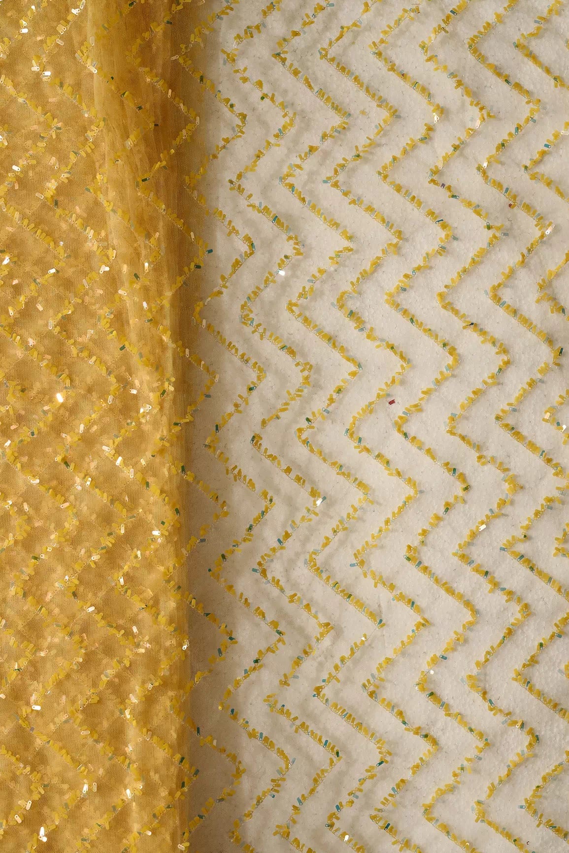 Oval Sequins Chevron Embroidery Work On Yellow Soft Net Fabric - doeraa