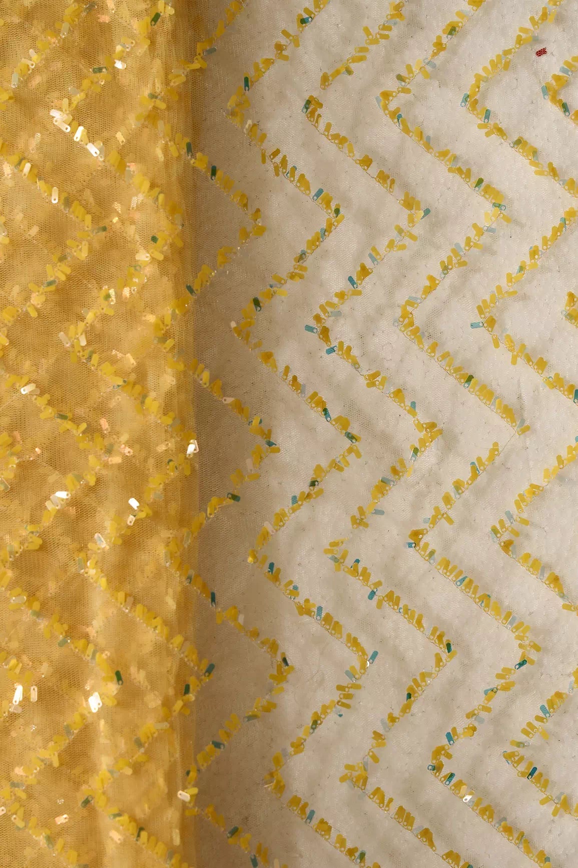 Oval Sequins Chevron Embroidery Work On Yellow Soft Net Fabric - doeraa