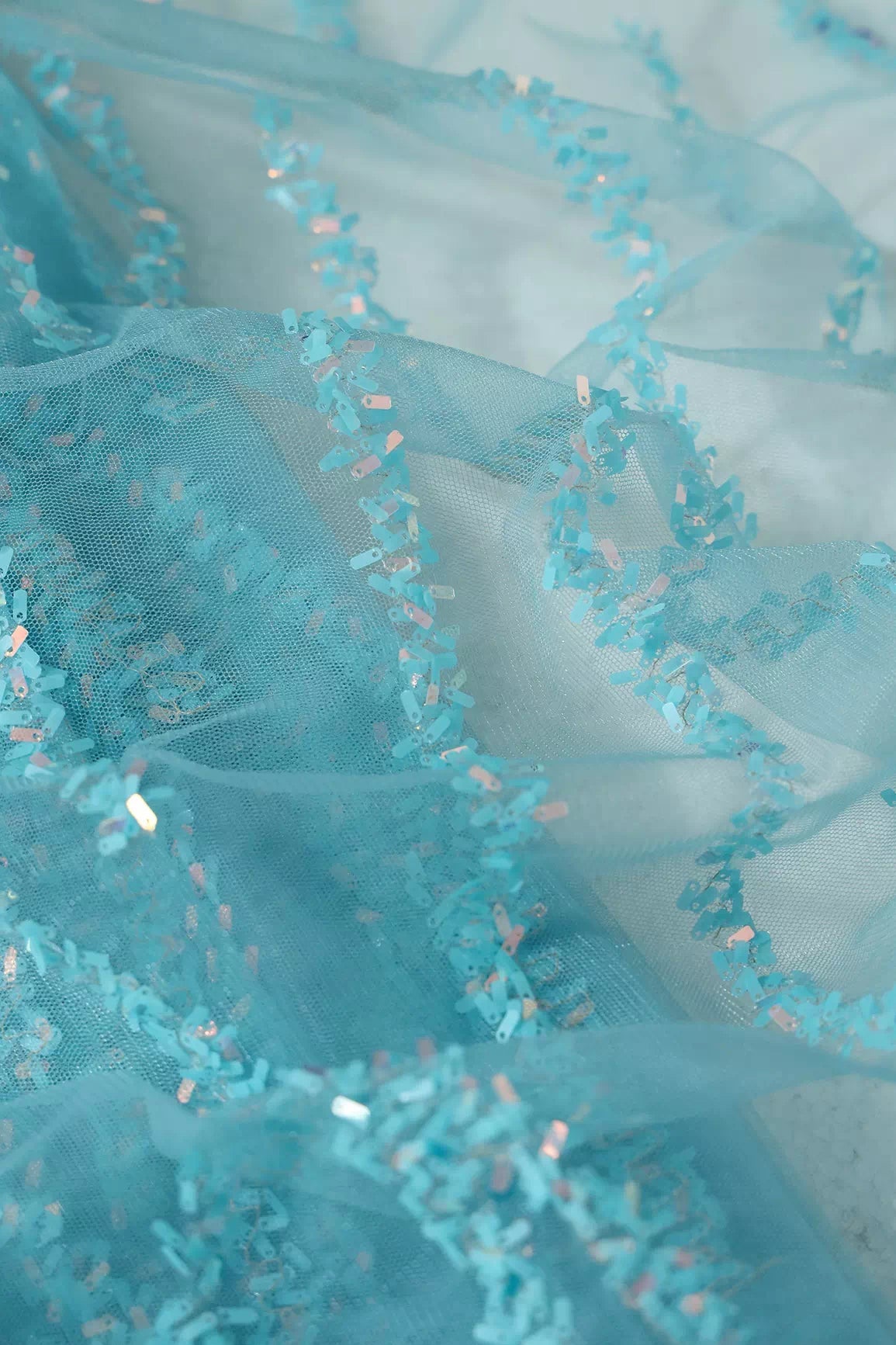 Oval Sequins Geometric Embroidery Work On Sky Blue Soft Net Fabric - doeraa