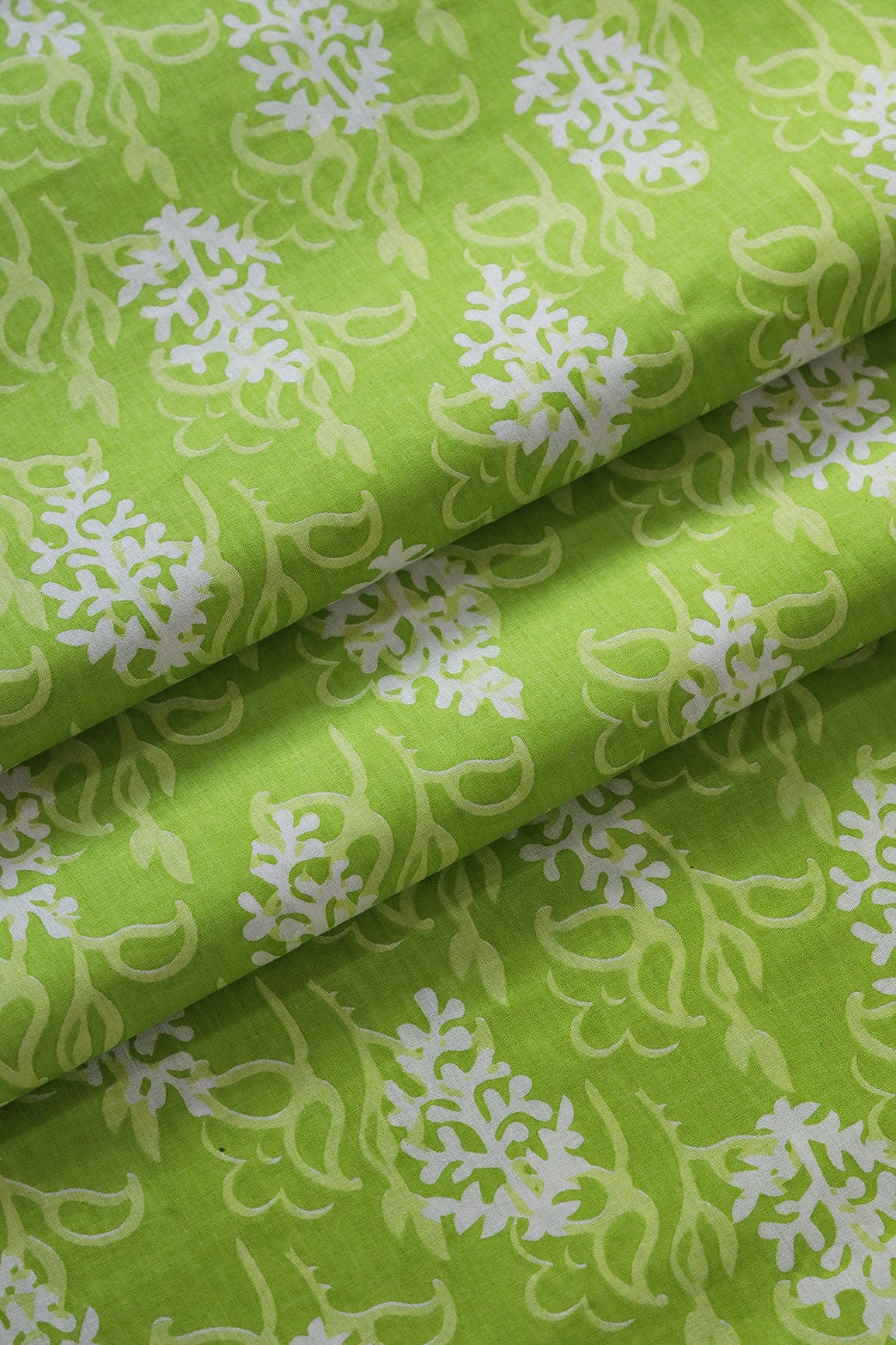 doeraa Prints Parrot Green And White Floral Print On Pure Cotton Fabric