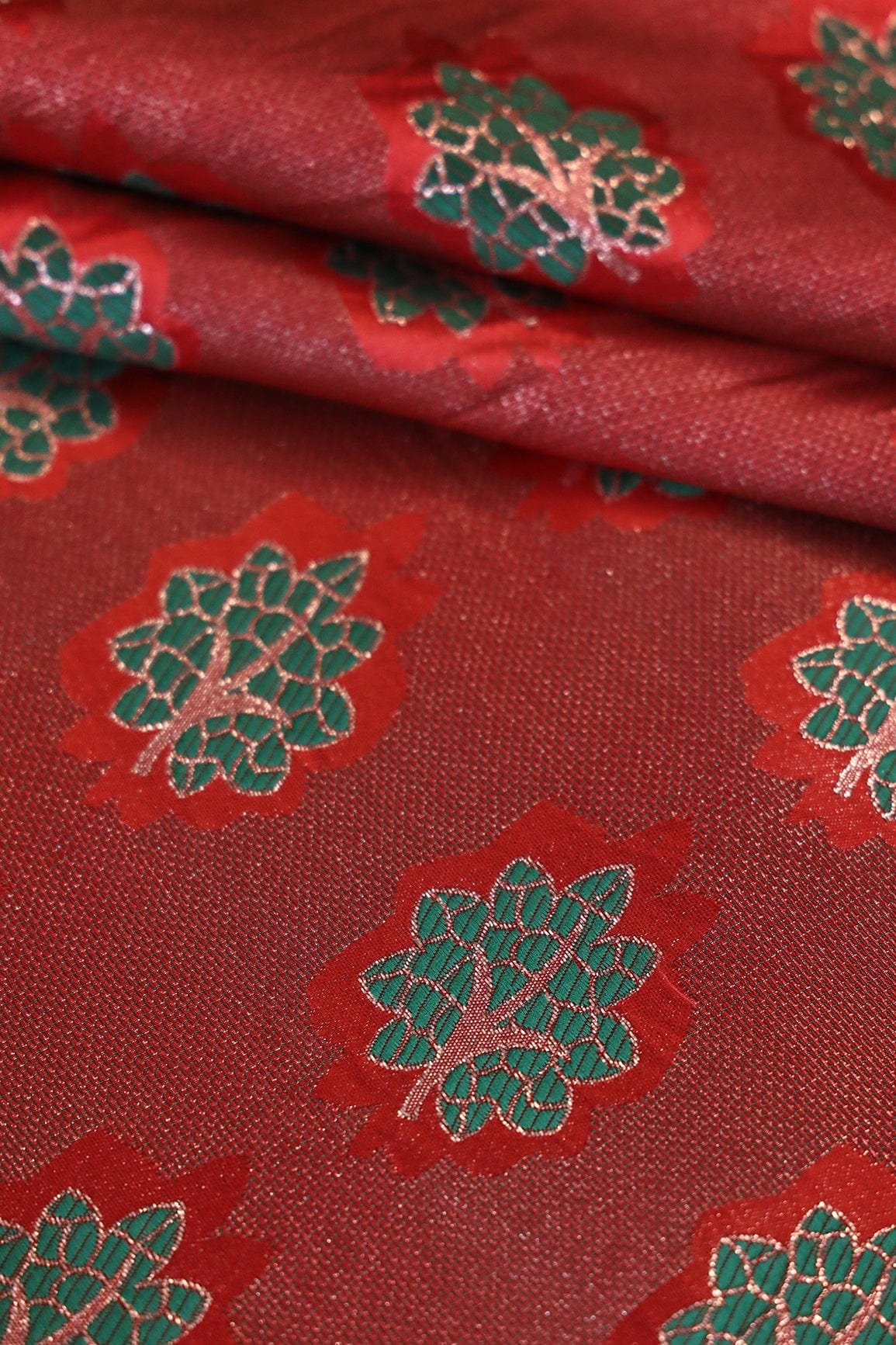 Red And Green Leafy Jute Banarasi Zari Jacquard Fabric - doeraa