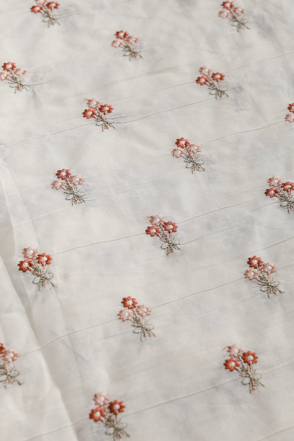 Rust And Peach Thread Small Floral Embroidery Work On Off White Organic Cotton Fabric - doeraa
