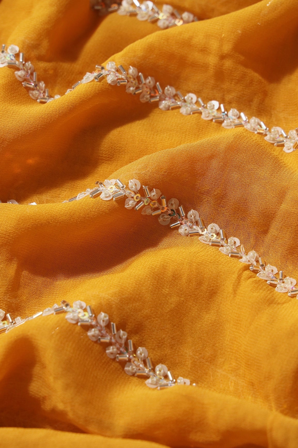 Silver Beads With Sequins Beautiful Stripes Handwork Embroidery On Yellow Viscose Georgette Fabric - doeraa