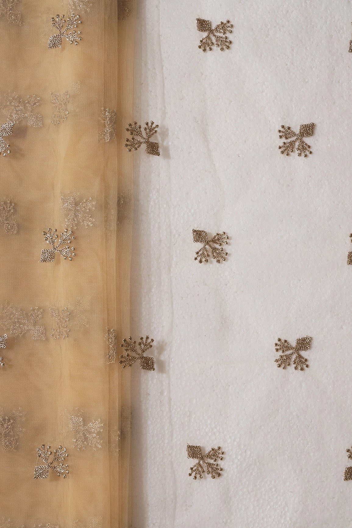 Small Gold Glitter Sequins With Zari Floral Embroidery On Beige Soft Net Fabric - doeraa