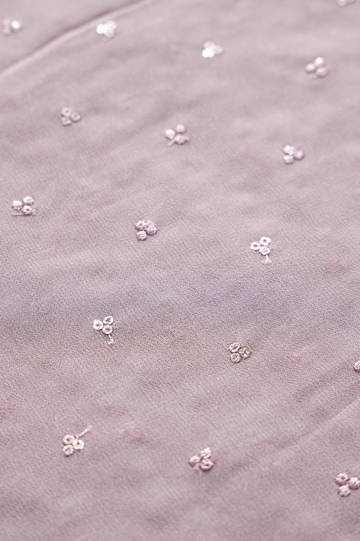 Small Motif Sequins Embroidery On Light Mauve Viscose Georgette Fabric - doeraa