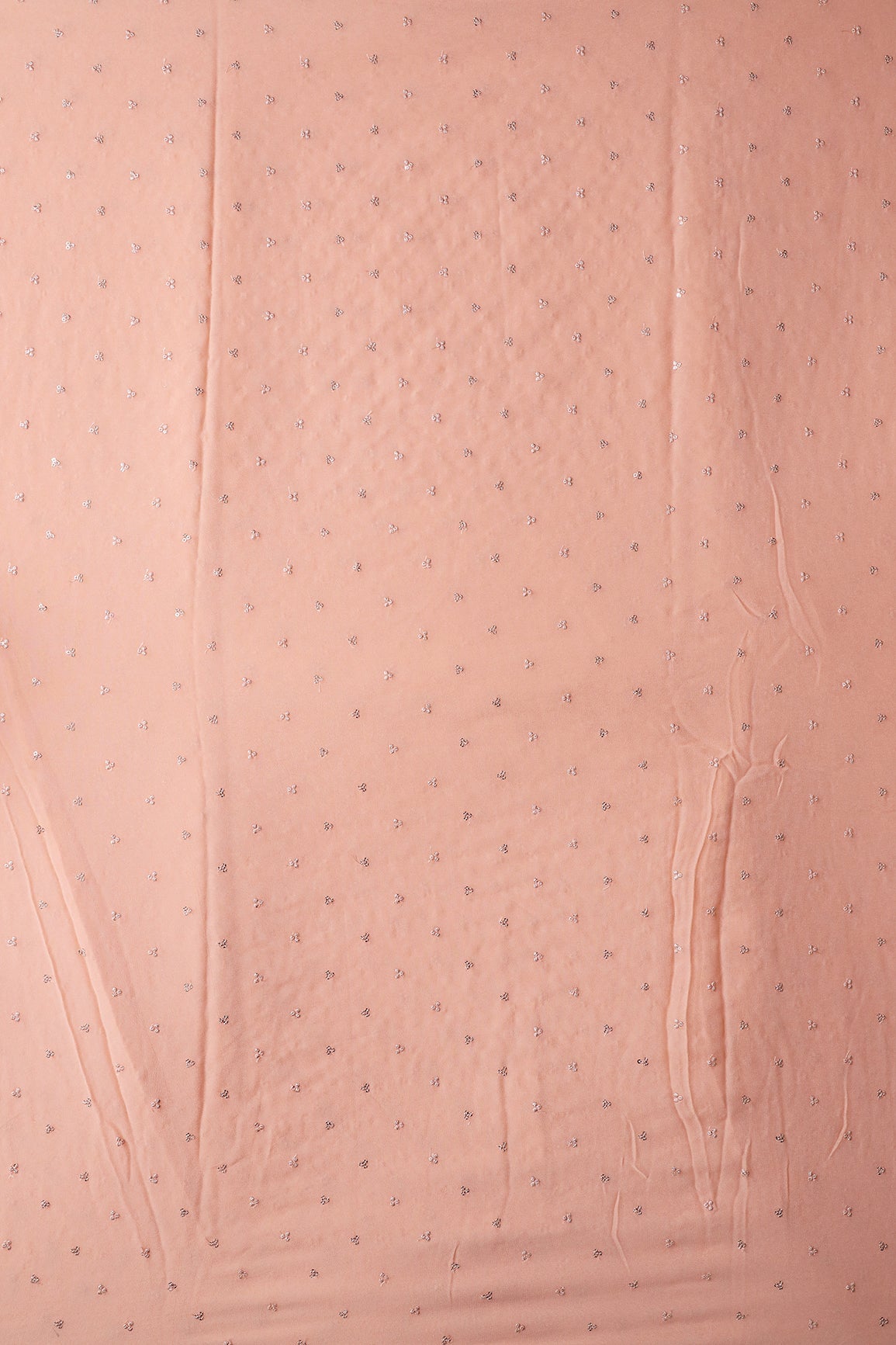Small Motif Sequins Embroidery On Peach Viscose Georgette Fabric - doeraa