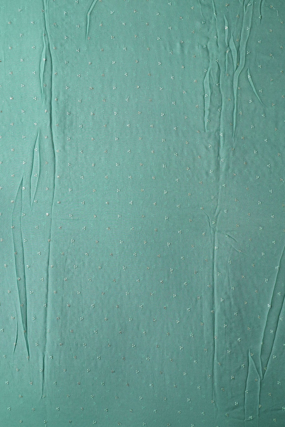 Small Motif Sequins Embroidery On Teal Viscose Georgette Fabric - doeraa