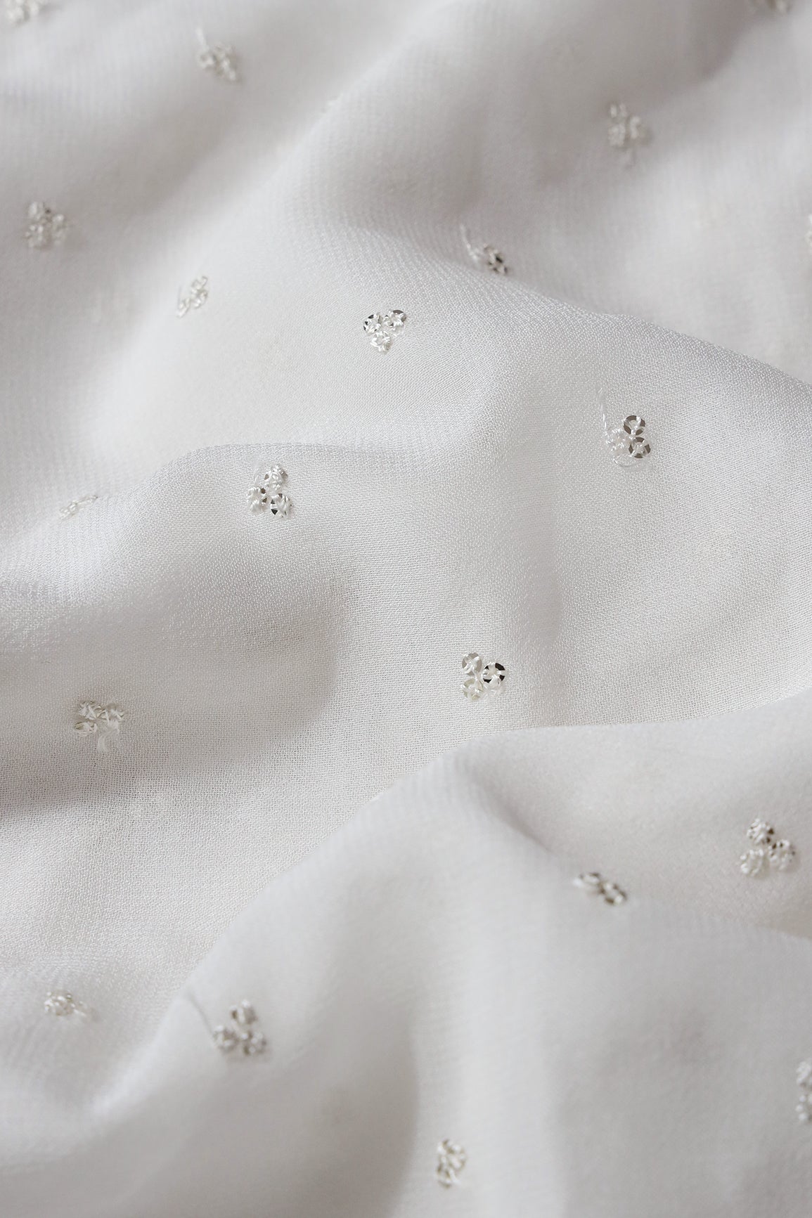 Small Motif Sequins Embroidery On White Dyeable Viscose Georgette Fabric - doeraa