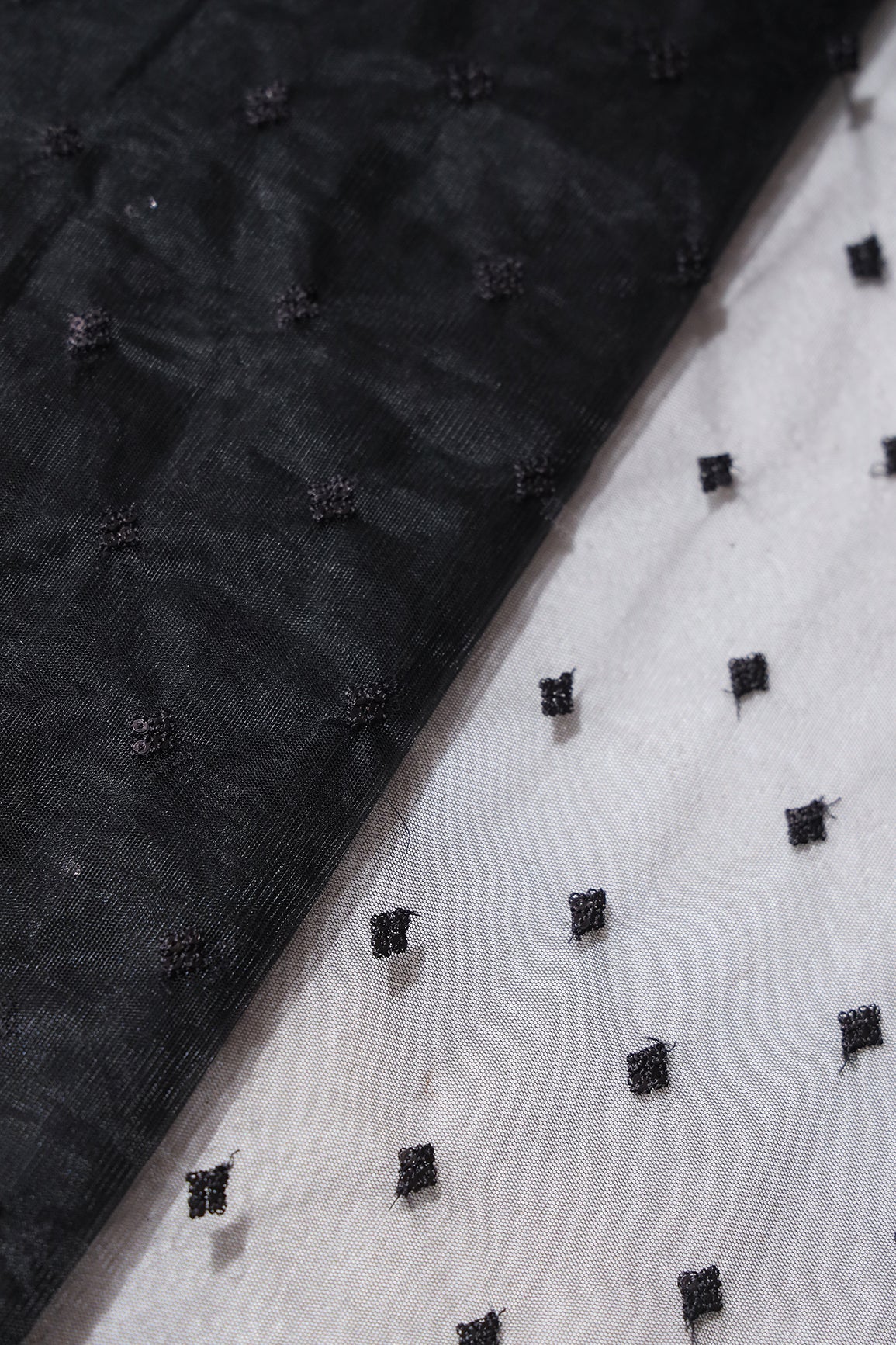 Small Motif Sequins Embroidery Work On Black Soft Net Fabric - doeraa