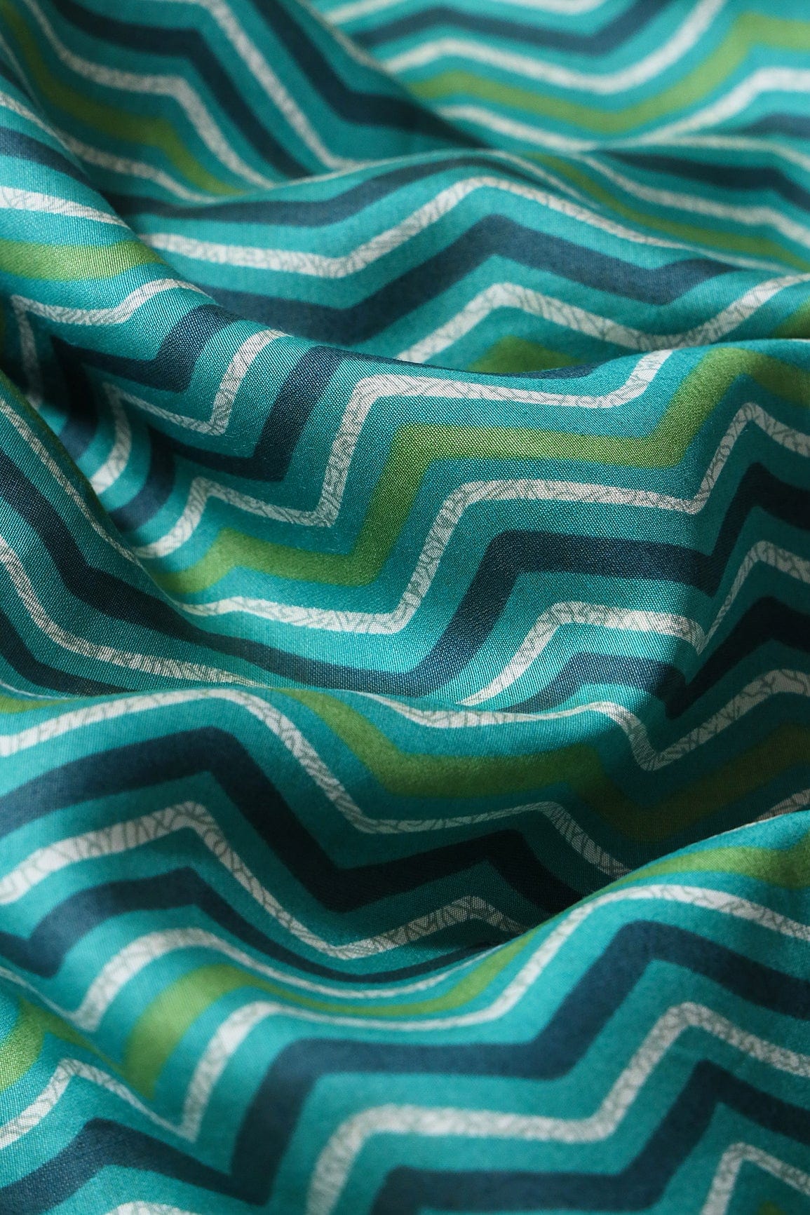 Teal And Cream Chevron Print On Viscose Chanderi Silk Fabric - doeraa