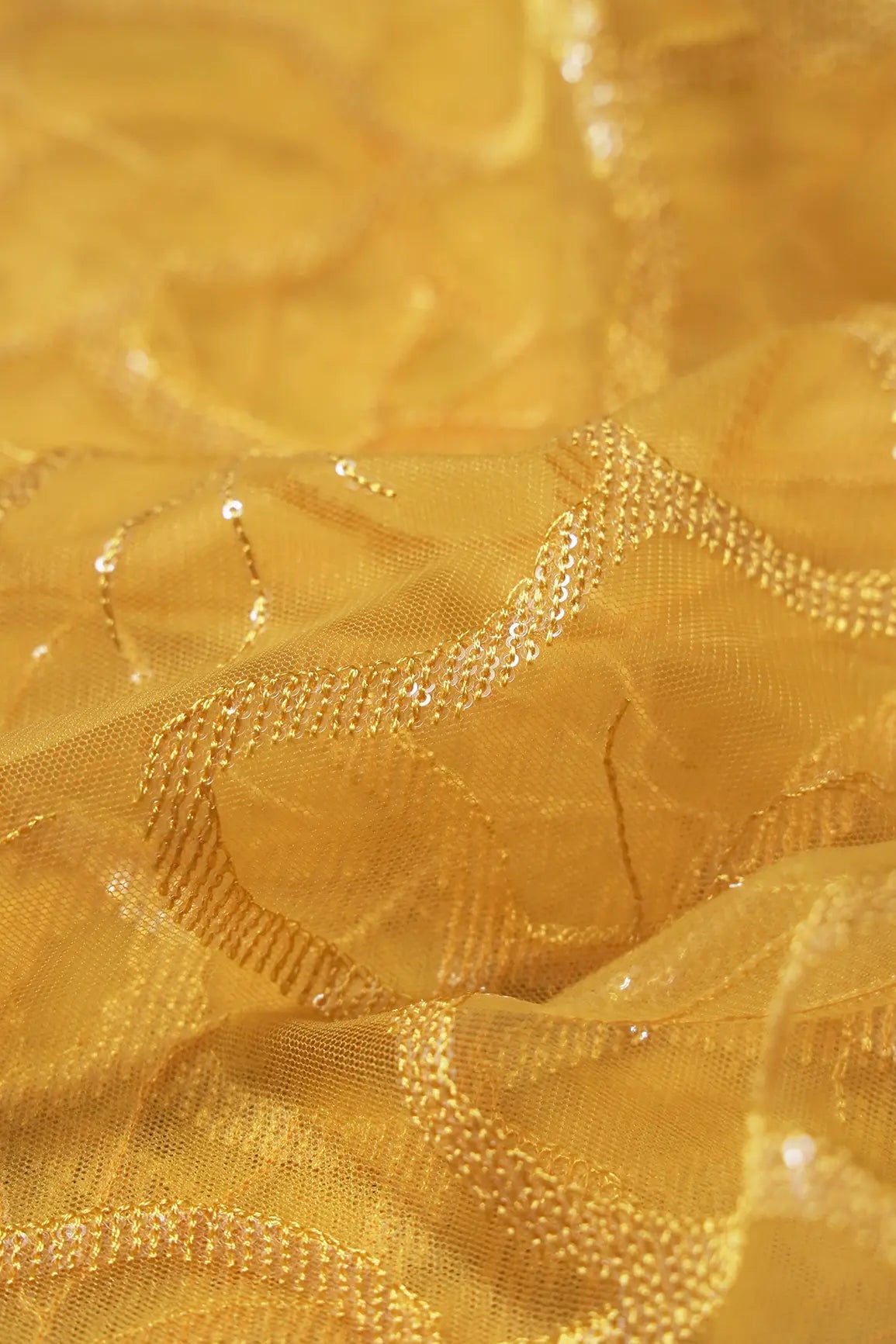 Water Sequins Abstract Embroidery On Yellow Soft Net Fabric - doeraa