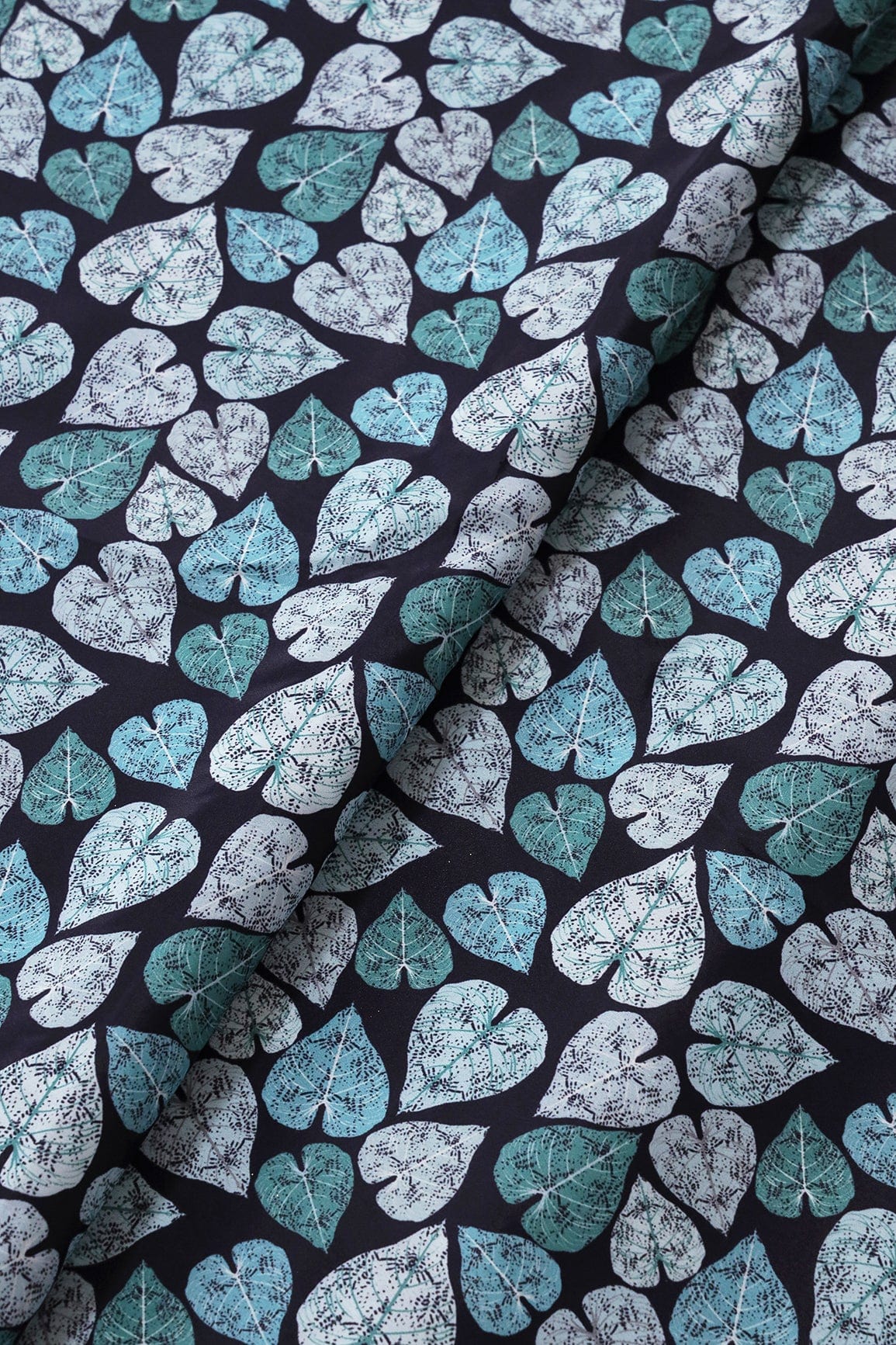 White And Teal Leafy Pattern Digital Print On Dark Navy Blue French Crepe Fabric - doeraa