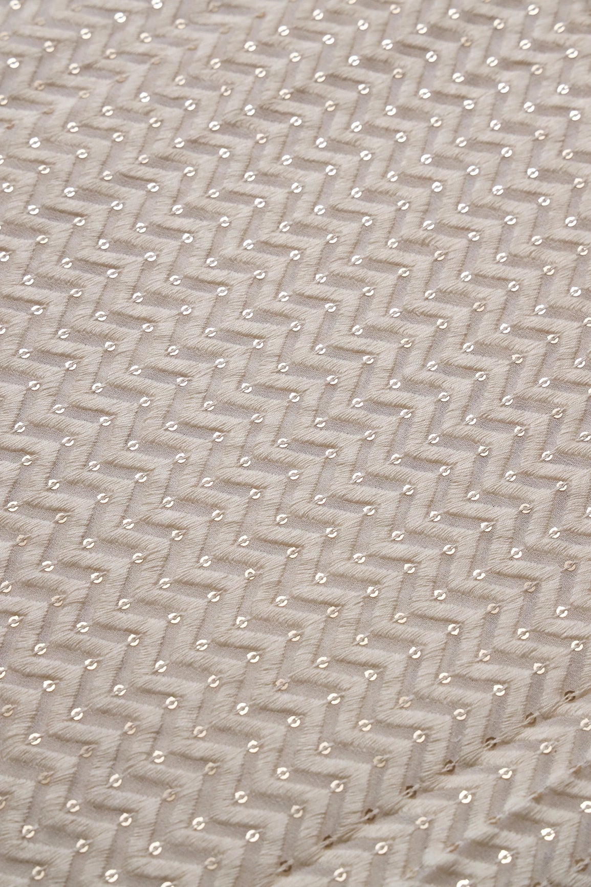 White Thread With Gold Sequins Chevron Embroidery Work On White Dyeable Viscose Georgette Fabric - doeraa